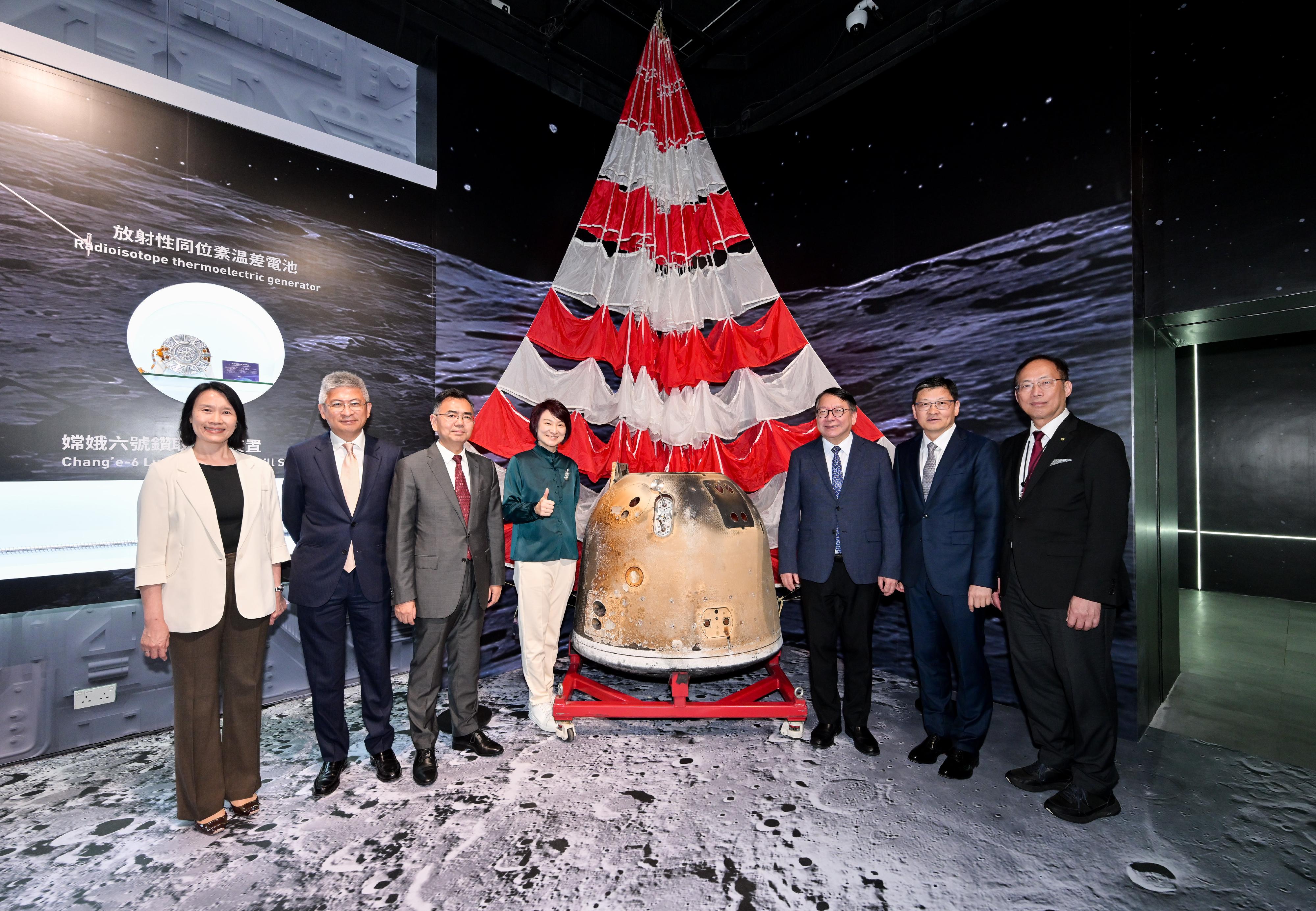 The Chief Secretary for Administration, Mr Chan Kwok-ki, attended the opening ceremony of the "Bank of China (Hong Kong) Presents: National Development and Achievements Series - Endless Exploration: The Journey of Chinese Aerospace, Aviation and Navigation" exhibition today (July 31). Photo shows Mr Chan (third right) touring the exhibition. Looking on are the Chief Engineer of the China National Space Administration, Dr Li Guoping (third left); the Vice Chairman and Chief Executive of Bank of China (Hong Kong) Limited, Mr Sun Yu (second right); the Convenor of the Working Group on Patriotic Education under the Constitution and Basic Law Promotion Steering Committee, Legislative Council Member, Dr Starry Lee (fourth left); the Chairperson of the Science Sub-committee of the Museum Advisory Committee, Professor Alexander Wai (first right); the Under Secretary for Culture, Sports and Tourism, Mr Raistlin Lau (second left); and the Director of Leisure and Cultural Services, Ms Manda Chan (first left). 