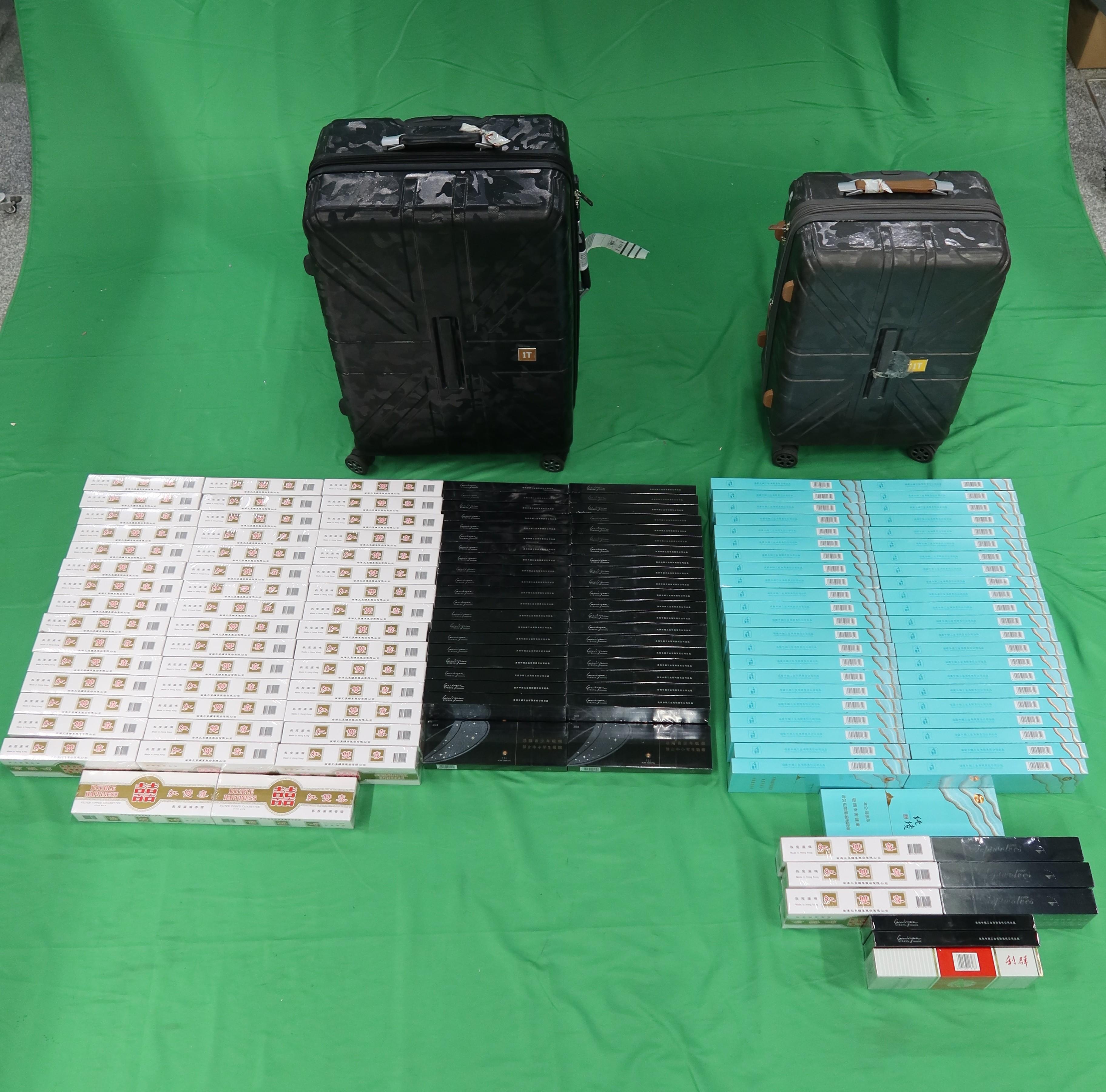Three incoming male passengers were sentenced to three to seven months' imprisonment and fined between $1,000 and $2,000 at the West Kowloon Magistrates' Courts yesterday (July 30) and today (July 31) for importing or possessing duty-not-paid cigarettes and failing to declare them to Customs officers, as well as for importing alternative smoking products. Two incoming passengers, a 46 year old and a 32 year old, were sentenced to six and seven months imprisonment respectively and fined $2,000 each today for importing duty-not-paid cigarettes and failing to declare them to Customs officers, in contravention of the Dutiable Commodities Ordinance. Photo shows the duty-not-paid cigarettes seized.

