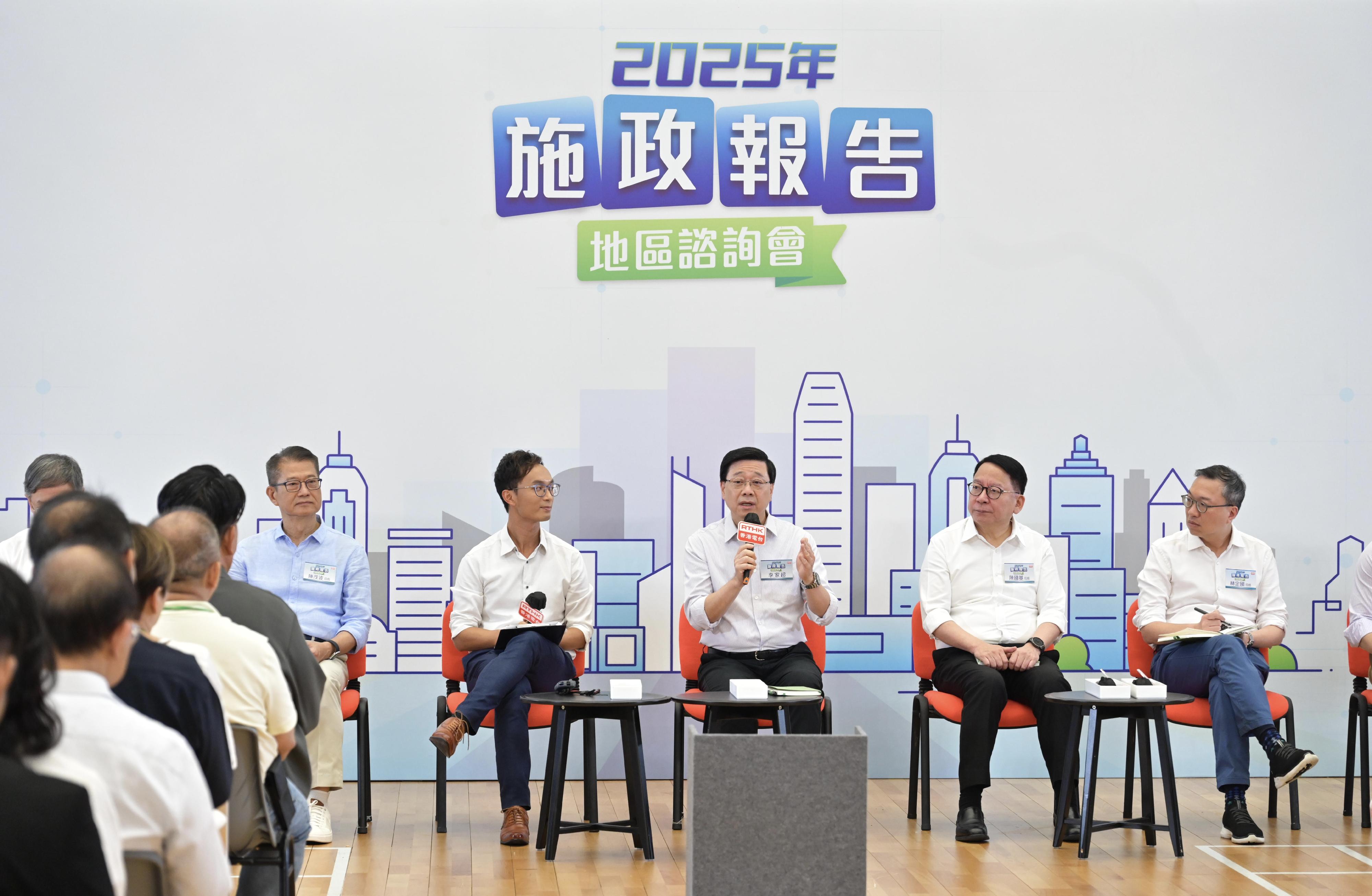 The Chief Executive, Mr John Lee, attended the second 2025 Policy Address District Forum with some Principal Officials this morning (August 3) to listen to views and suggestions from local community members on the upcoming Policy Address. Photo shows Mr Lee (centre); the Chief Secretary for Administration, Mr Chan Kwok-ki (second right); the Financial Secretary, Mr Paul Chan (first left), and the Secretary for Justice, Mr Paul Lam, SC (first right), listening to views from the public at the consultation session.