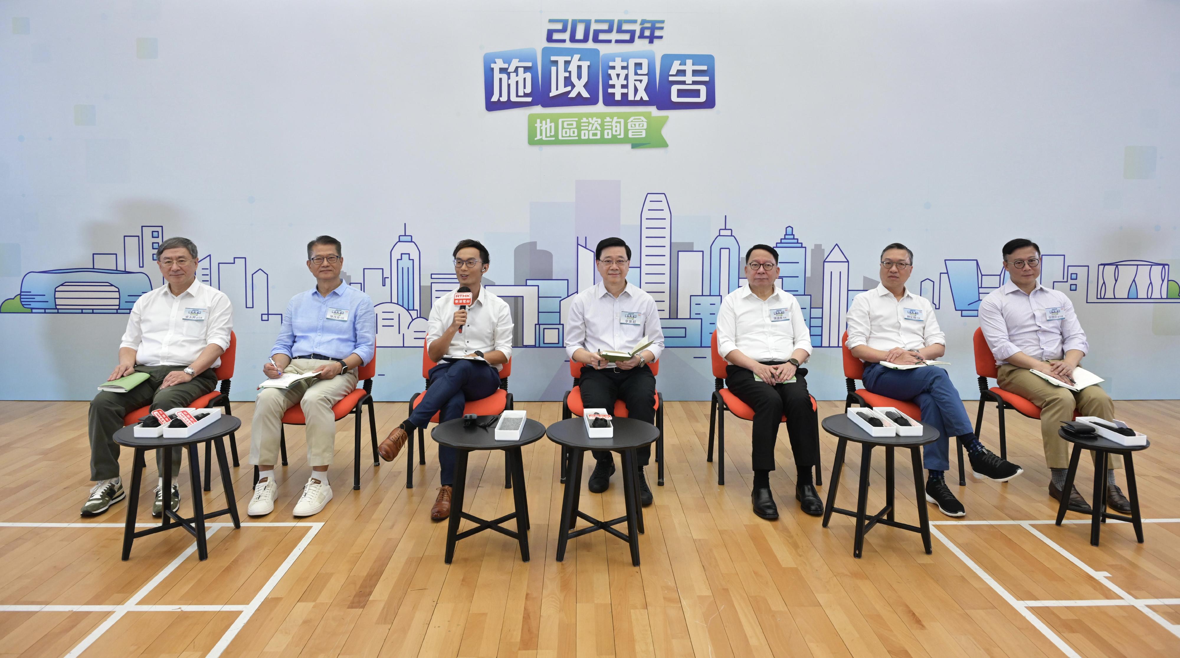 The Chief Executive, Mr John Lee, attended the second 2025 Policy Address District Forum with some Principal Officials this morning (August 3) to listen to views and suggestions from local community members on the upcoming Policy Address. Photo shows Mr Lee (centre); the Chief Secretary for Administration, Mr Chan Kwok-ki (third right); the Financial Secretary, Mr Paul Chan (second left); the Secretary for Justice, Mr Paul Lam, SC (second right); the Deputy Chief Secretary for Administration, who is undertaking the duties of the Secretary for Housing, Mr Cheuk Wing-hing (first left), and the Deputy Secretary for Justice, Dr Cheung Kwok-kwan (first right), listening to views from the public at the consultation session.