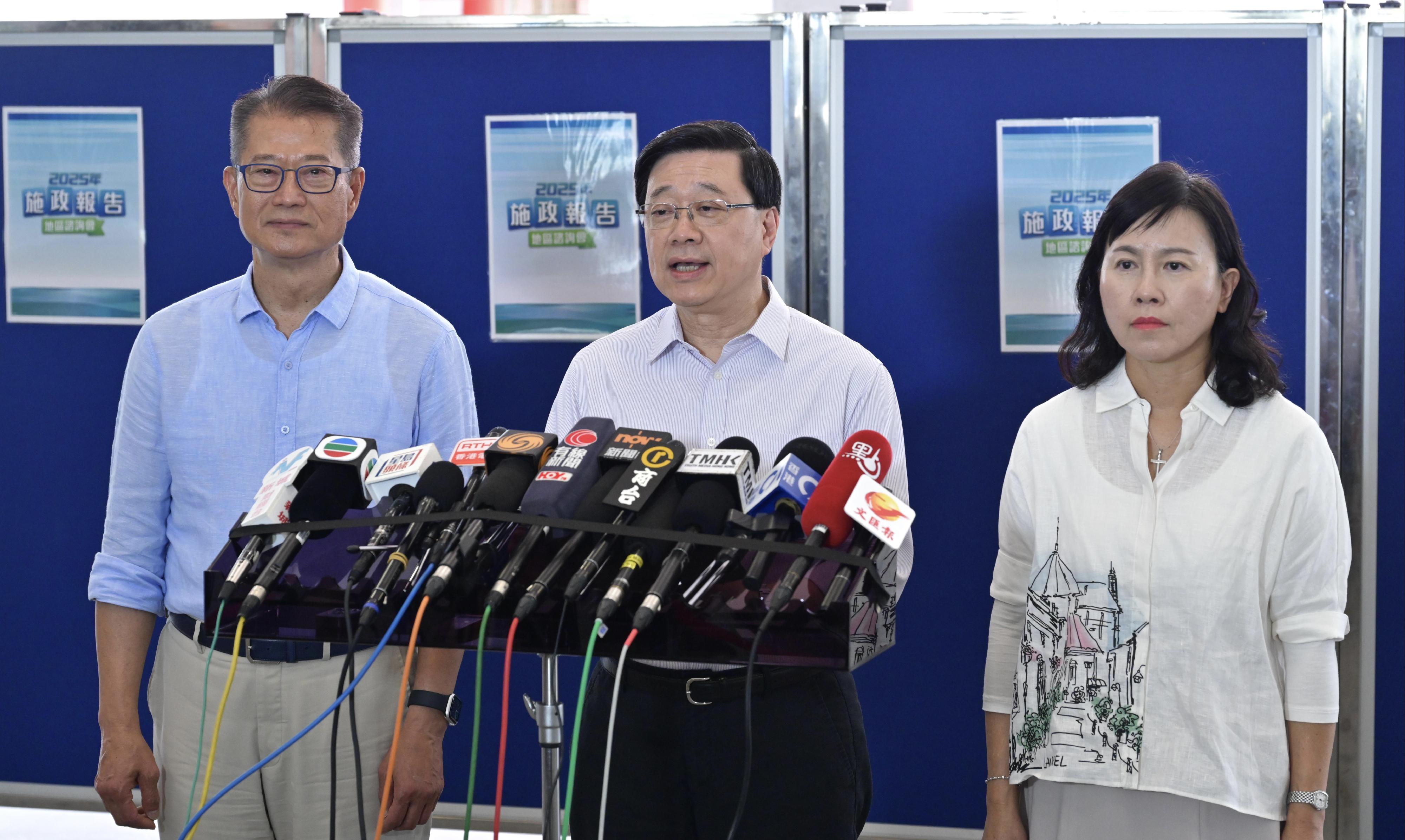 The Chief Executive, Mr John Lee, attended the second 2025 Policy Address District Forum with some Principal Officials this morning (August 3) to listen to views and suggestions from local community members on the upcoming Policy Address. Photo shows Mr Lee (centre); the Financial Secretary, Mr Paul Chan (left), and the Secretary for Transport and Logistics, Ms Mable Chan (right), meeting the media after the District Forum.