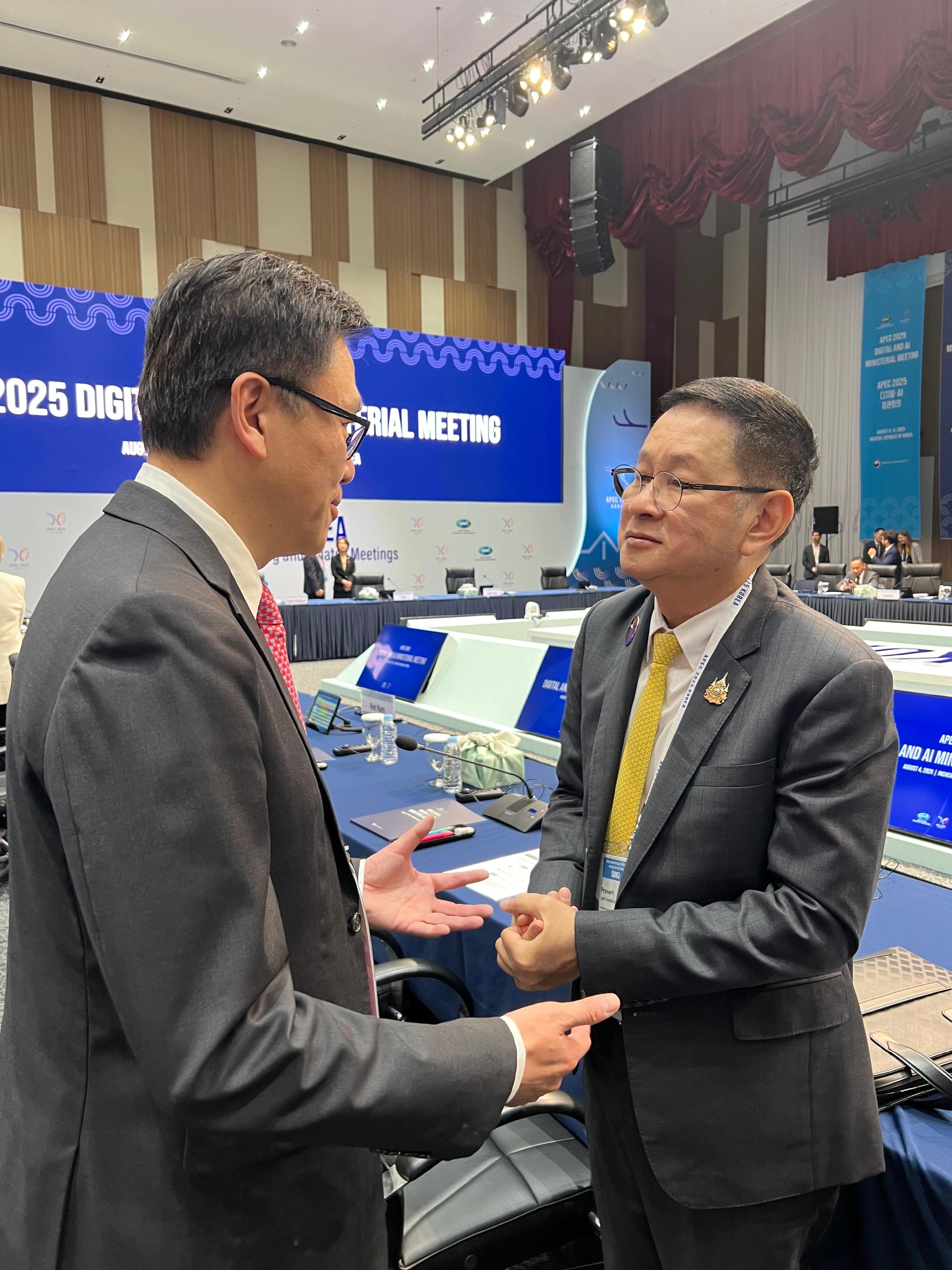 The Secretary for Innovation, Technology and Industry, Professor Sun Dong, attended the Asia-Pacific Economic Cooperation Digital and AI Ministerial Meeting in Incheon, Korea, today (August 4). Photo shows Professor Sun (left) having an exchange with the Deputy Prime Minister and the Minister of Digital Economy and Society of Thailand, Mr Prasert Jantararuangtong (right), during the Meeting.