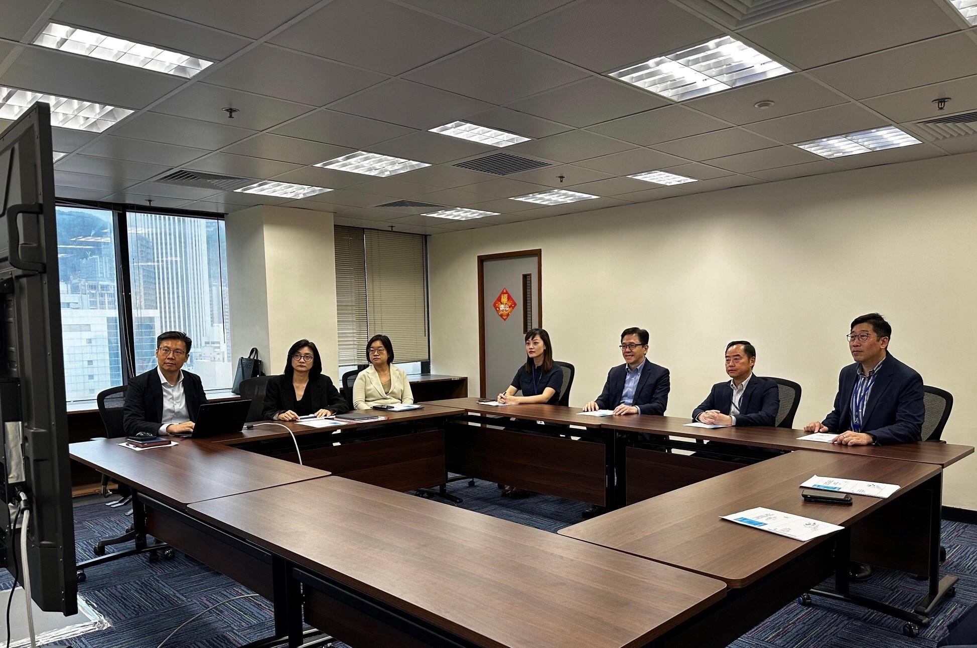 The Secretary for Innovation, Technology and Industry, Professor Sun Dong (third right); the Under Secretary for Innovation, Technology and Industry, Ms Lillian Cheong (fourth right); the Commissioner for Digital Policy, Mr Tony Wong (second right); and the Deputy Commissioner for Digital Policy (Digital Infrastructure), Mr Daniel Cheung (first right), held a working meeting yesterday (August 11) to review the latest work progress of IT infrastructure of the Digital Policy Office for the Hong Kong competition region for the Hong Kong competition region for the 15th National Games, the 12th National Games for Persons with Disabilities and the 9th National Special Olympic Games.