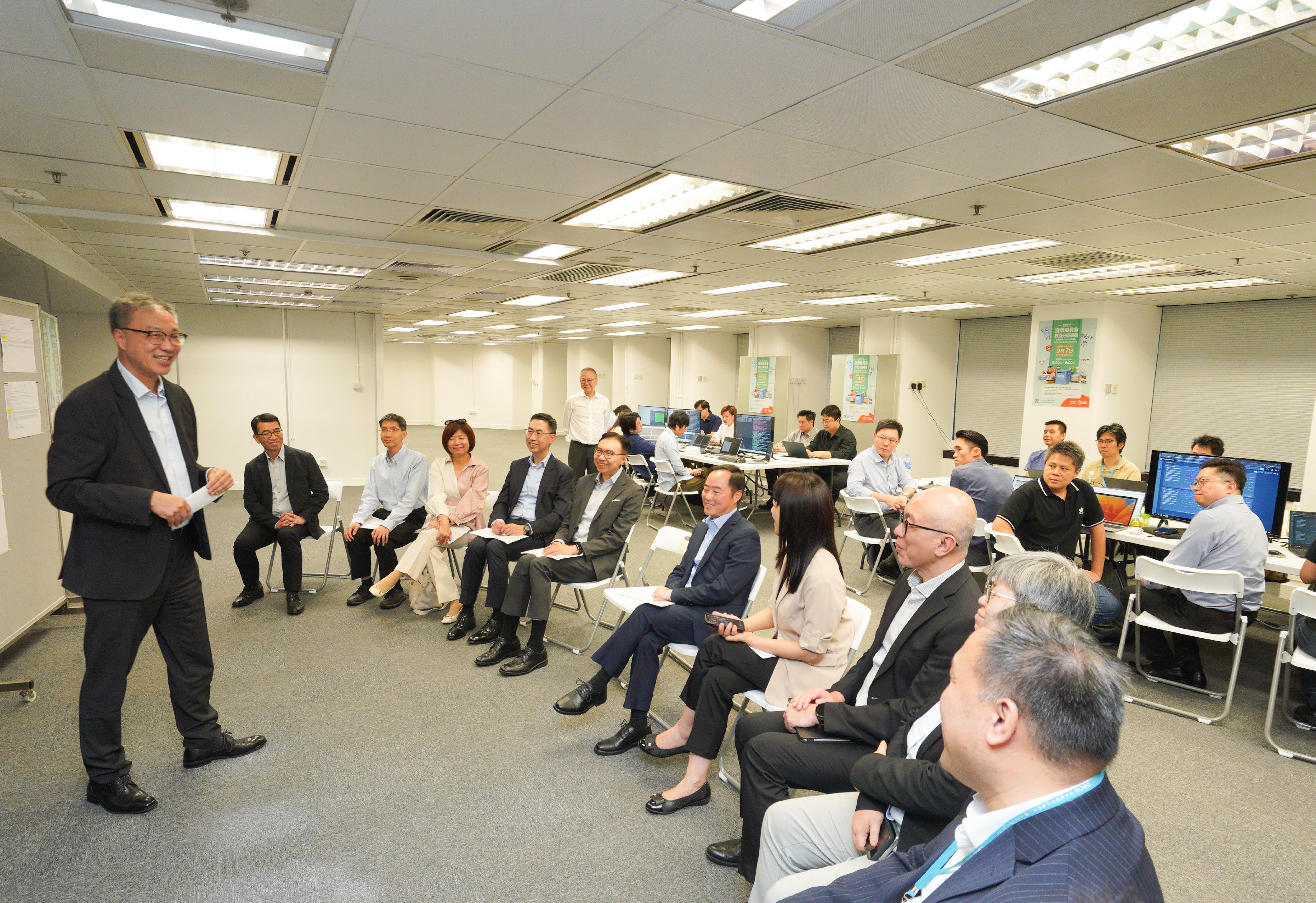 The Registration and Electoral Office (REO) and the Digital Policy Office (DPO) hosted a drill on technical support for regular and contingency arrangements of the Electronic Poll Register (EPR) System today (August 13) for comprehensive preparation and detailed planning for the Election Committee Subsector By-elections to be held on September 7 and the Legislative Council General Election to be held on December 7. The Chairman of the Electoral Affairs Commission, Mr Justice David Lok (first left), thanked the REO, the DPO and the EPR System contractor for their joint participation in the drill to ensure the smooth issuance of ballot papers at the two elections. The Commissioner for Digital Policy, Mr Tony Wong (fifth right); the Chief Electoral Officer of the REO, Ms Natalie Chan (fourth right); the Convenor of the Technical Advisory Committee (TAC), Mr Sunny Lee (sixth left), and Members of the TAC were also present.