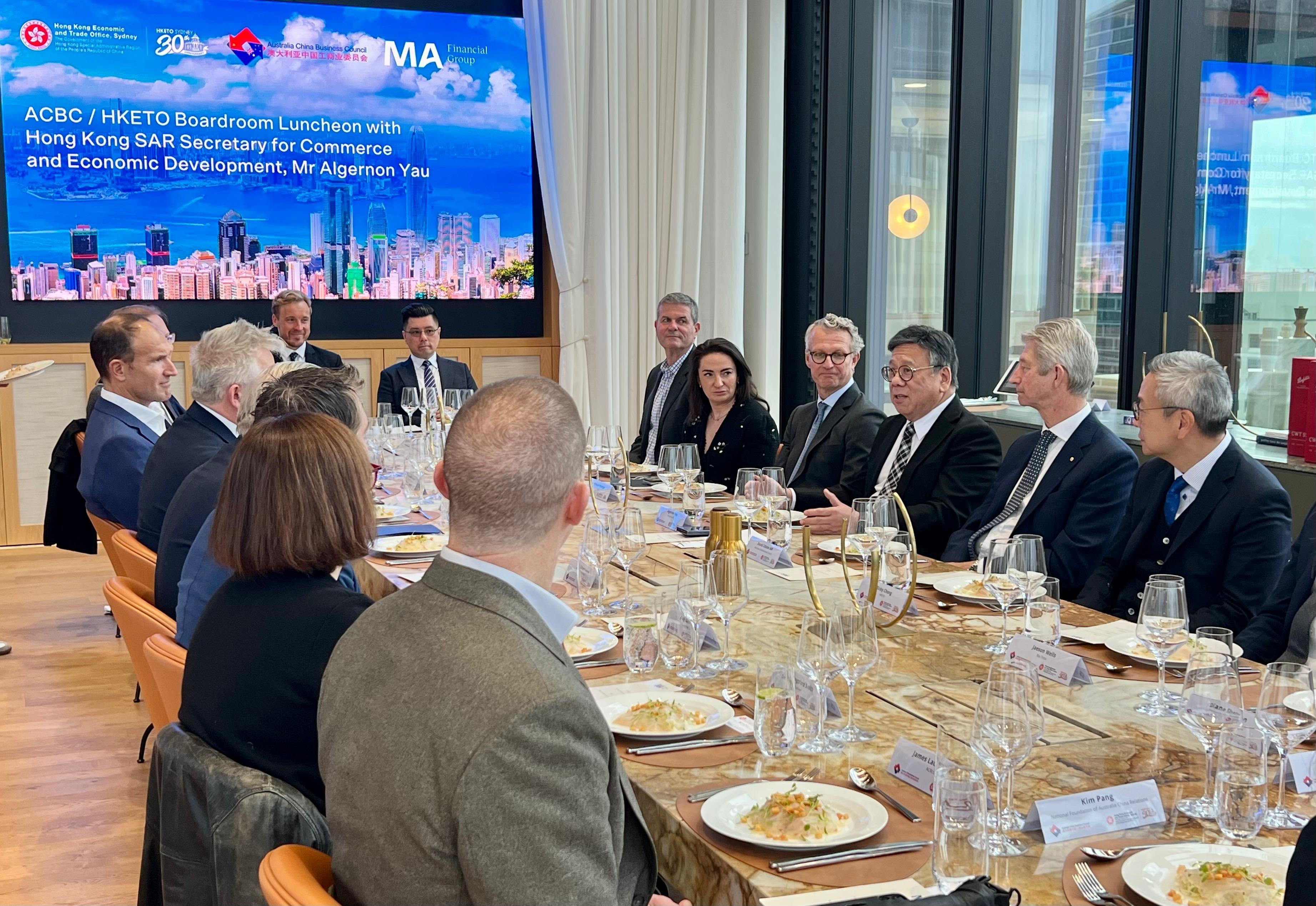 The Secretary for Commerce and Economic Development, Mr Algernon Yau, continued his visit to Sydney, Australia, today (August 14) to promote Hong Kong's advantages as an international trade centre and a premier destination for business and investment. Photo shows Mr Yau (third right) attending a business roundtable luncheon with members of the Australia China Business Council (ACBC) to brief them on Hong Kong's role as a springboard for Australian businesses looking to tap into the Guangdong-Hong Kong-Macao Greater Bay Area and the broader Asian markets. Looking on are the National President of the ACBC, Mr David Olsson (second right), and the Director of the Hong Kong Economic and Trade Office, Sydney, Mr Ricky Chong (first right).