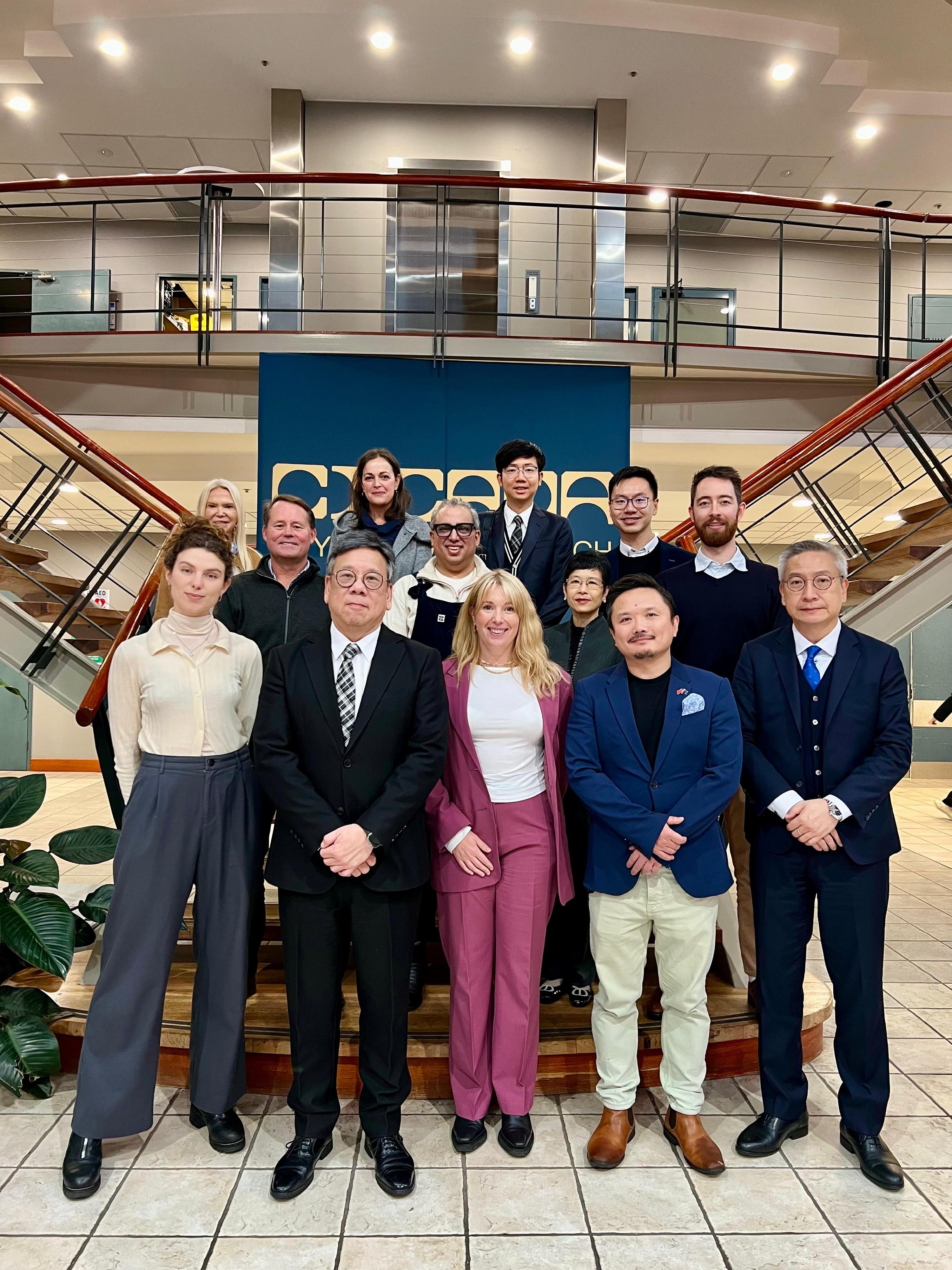 The Secretary for Commerce and Economic Development, Mr Algernon Yau, continued his visit to Sydney, Australia, today (August 14) to promote Hong Kong's advantages as an international trade centre and a premier destination for business and investment. Photo shows Mr Yau (front row, second left) before touring a leading incubator for start-ups. Also present is the Director of the Hong Kong Economic and Trade Office, Sydney, Mr Ricky Chong (front row, first right).