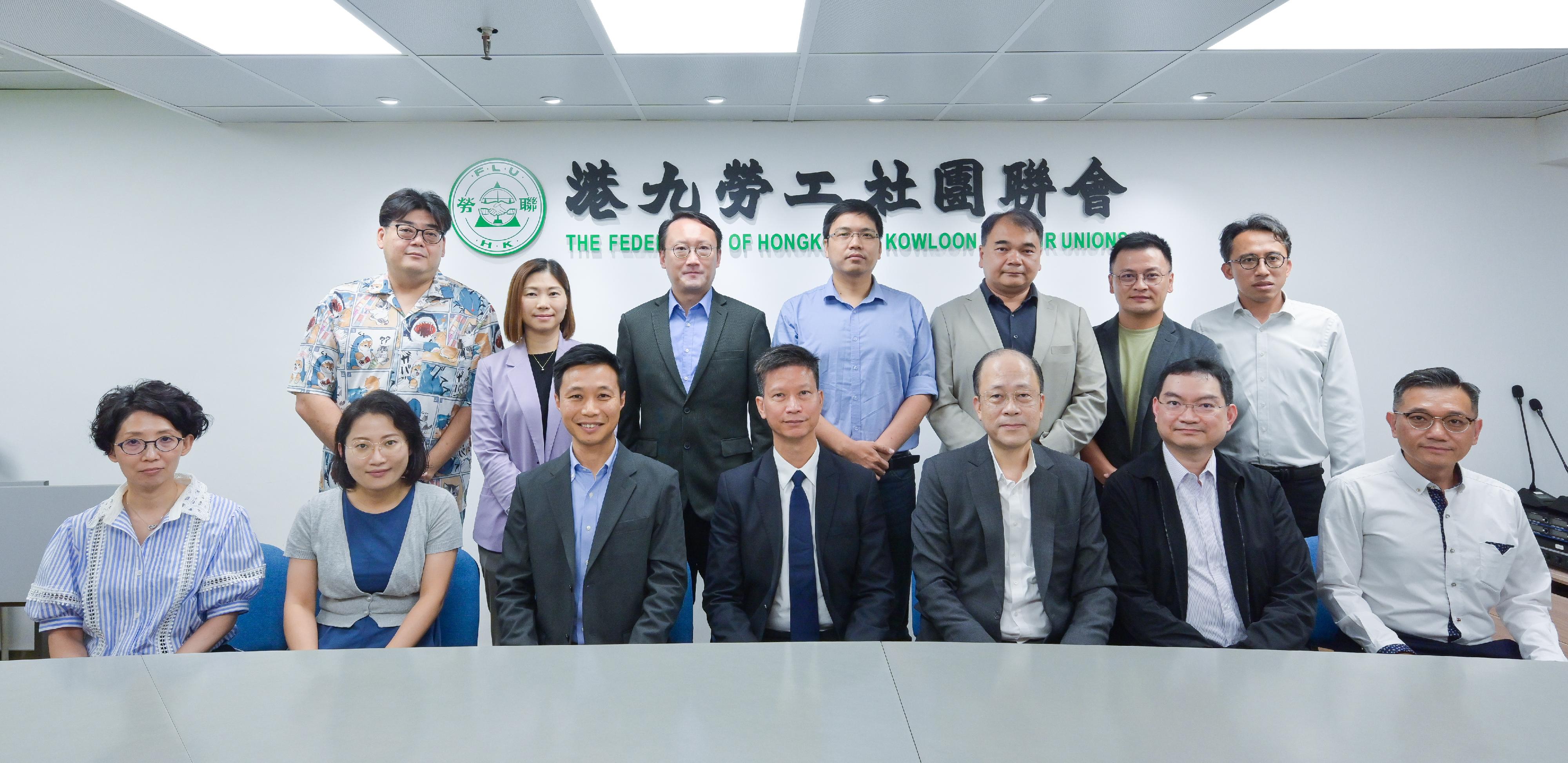 The Commissioner for Labour, Mr Sam Hui, has visited labour organisations and employer associations in the past month to strengthen communication and engagement with employees and employers. Photo shows Mr Hui (front row, centre) visiting the Federation of Hong Kong & Kowloon Labour Unions.