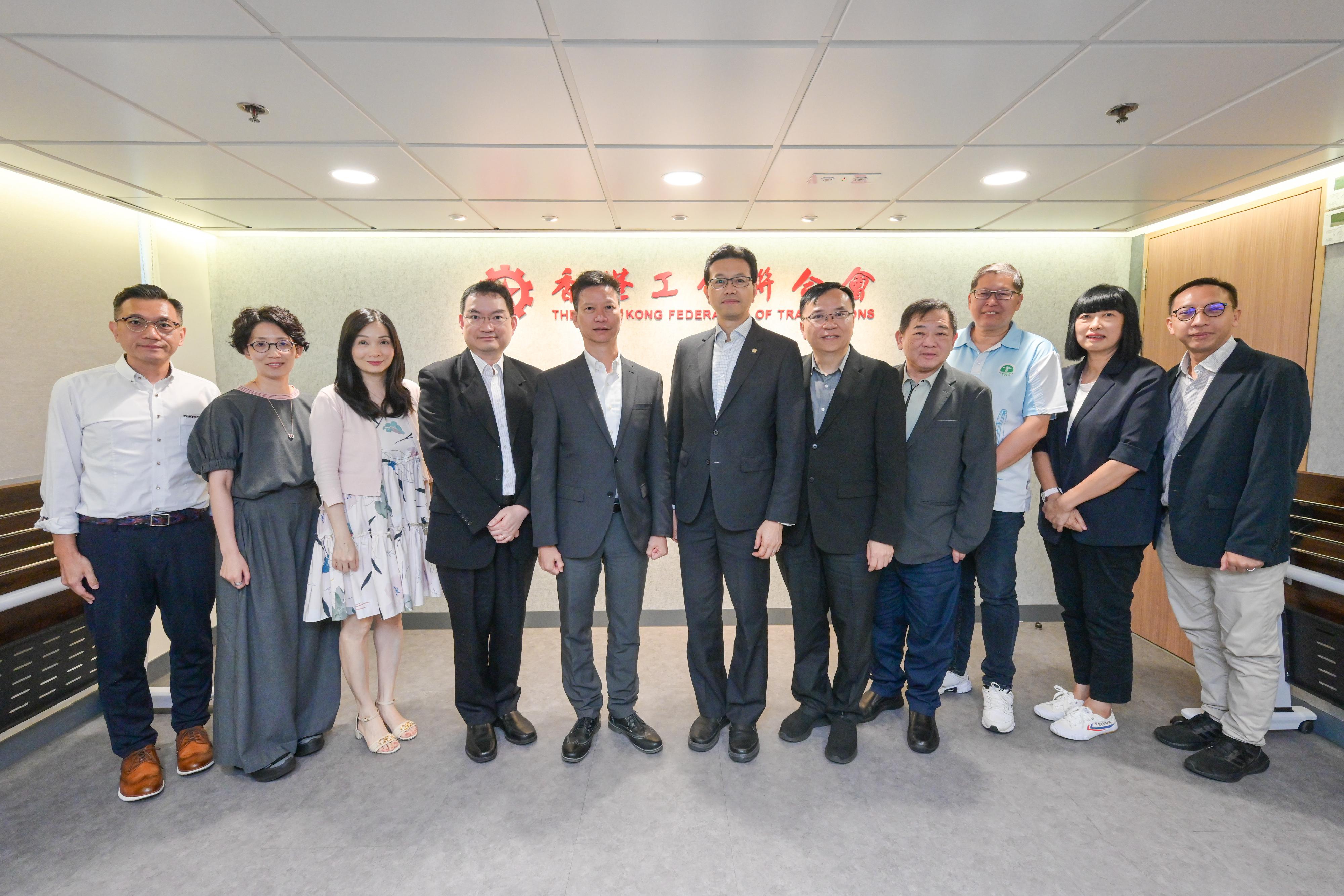 The Commissioner for Labour, Mr Sam Hui, has visited labour organisations and employer associations in the past month to strengthen communication and engagement with employees and employers. Photo shows Mr Hui (fifth left) visiting the Hong Kong Federation of Trade Unions.