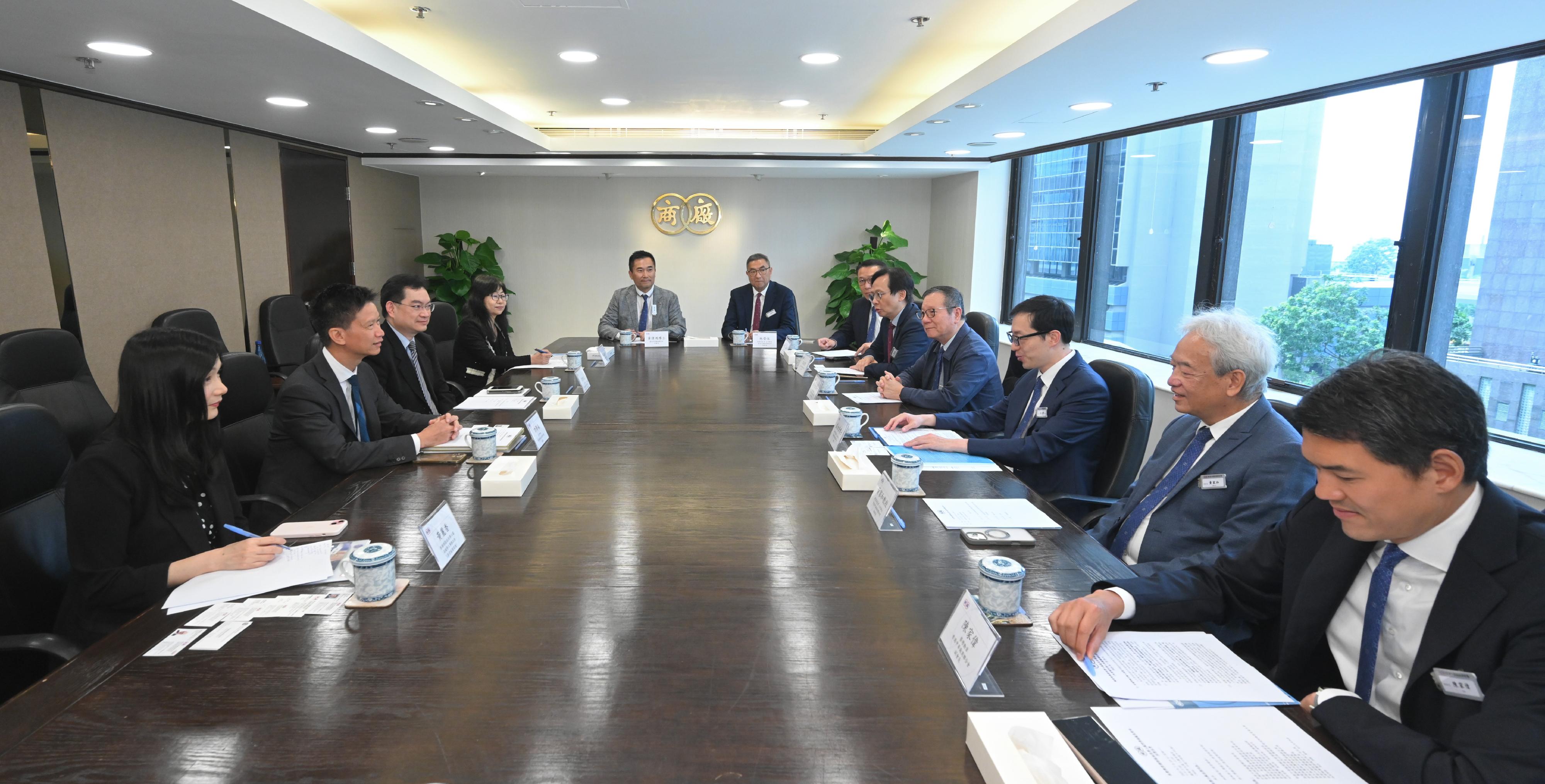 The Commissioner for Labour, Mr Sam Hui, has visited labour organisations and employer associations in the past month to strengthen communication and engagement with employees and employers. Photo shows Mr Hui (second left) visiting the Chinese Manufacturers' Association of Hong Kong.
