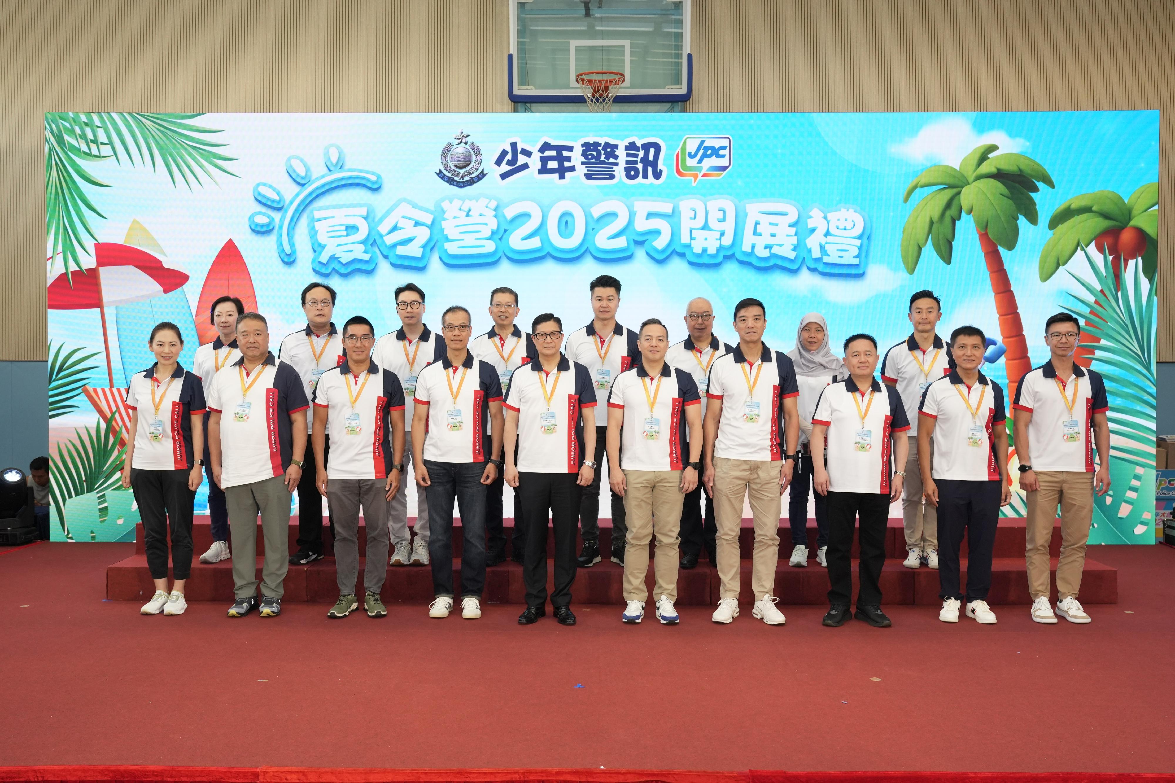 The Secretary for Security cum Junior Police Call (JPC) Honorary Chief President, Mr Tang Ping-keung (front row, fifth left); the Commissioner of Police cum JPC Honorary Deputy Chief President, Mr Chow Yat-ming (front row, fifth right); the Deputy Commissioner of Police (Operations), Mr Yip Wan-lung (front row, fourth left); the Director of Operations, Mr Lui Kam-ho (front row, fourth right); and the Assistant Commissioner of Police (Public Relations) cum Chairperson of JPC Central Advisory Board, Mr Chan Sze-tat (front row, third left), in a group photo with other guests at the Opening Ceremony of JPC Summer Camp 2025 held today (August 20).