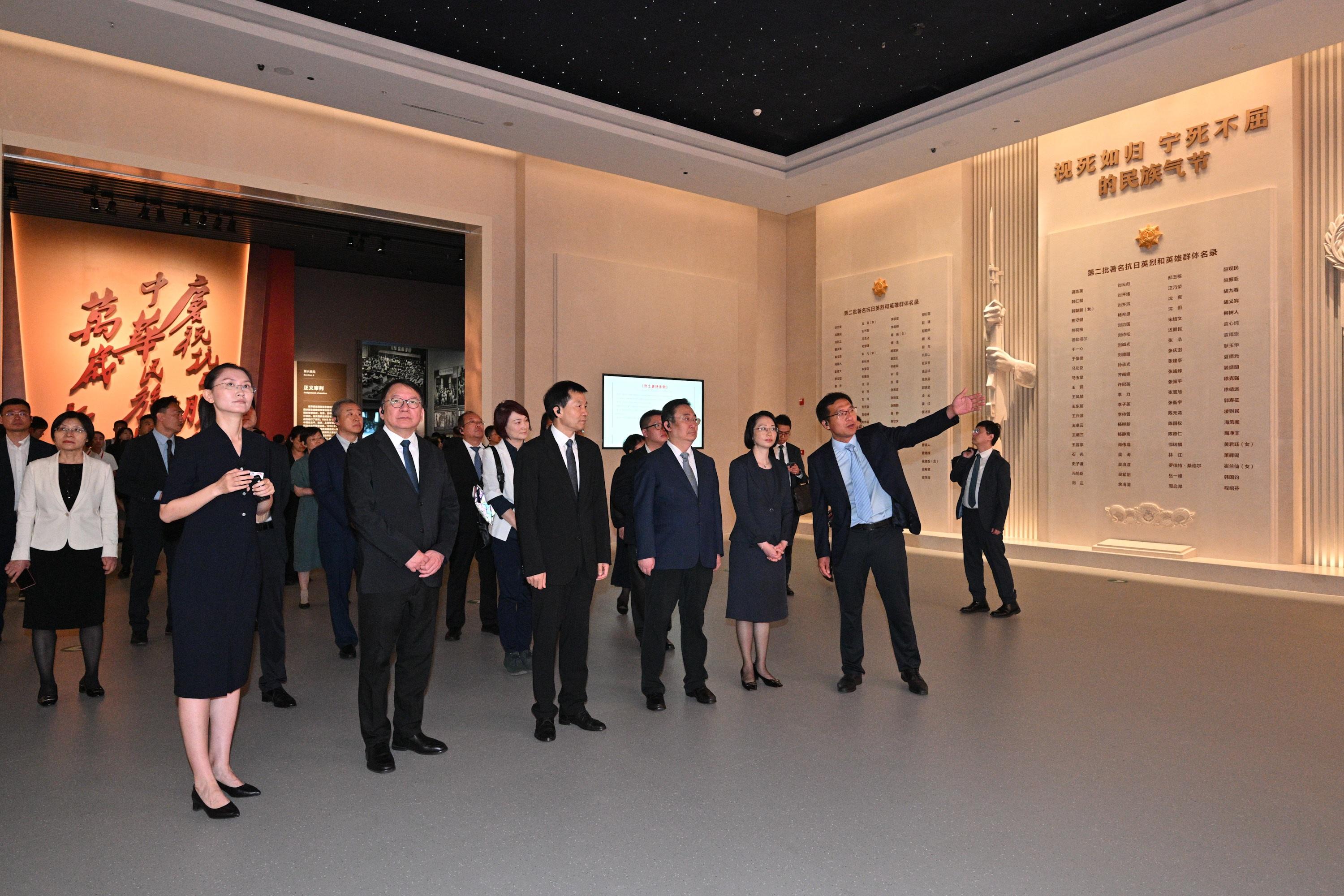 The Chief Secretary for Administration, Mr Chan Kwok-ki, attended the establishment ceremony of the Patriotic Education Base for Hong Kong and Macao Youth in Beijing today (August 21). Photo shows Mr Chan (front row, second left) touring the Museum of the War of Chinese People's Resistance Against Japanese Aggression where the establishment ceremony was held. Looking on are the Executive Deputy Director of the Hong Kong and Macao Work Office of the CPC Central Committee and the Hong Kong and Macao Affairs Office of the State Council, Mr Xu Qifang (front row, third left); Vice Mayor of Beijing Mr Xia Linmao (front row, third right); and the Secretary for Social Affairs and Culture of the Macao Special Administrative Region Government, Ms O Lam (front row, second right).