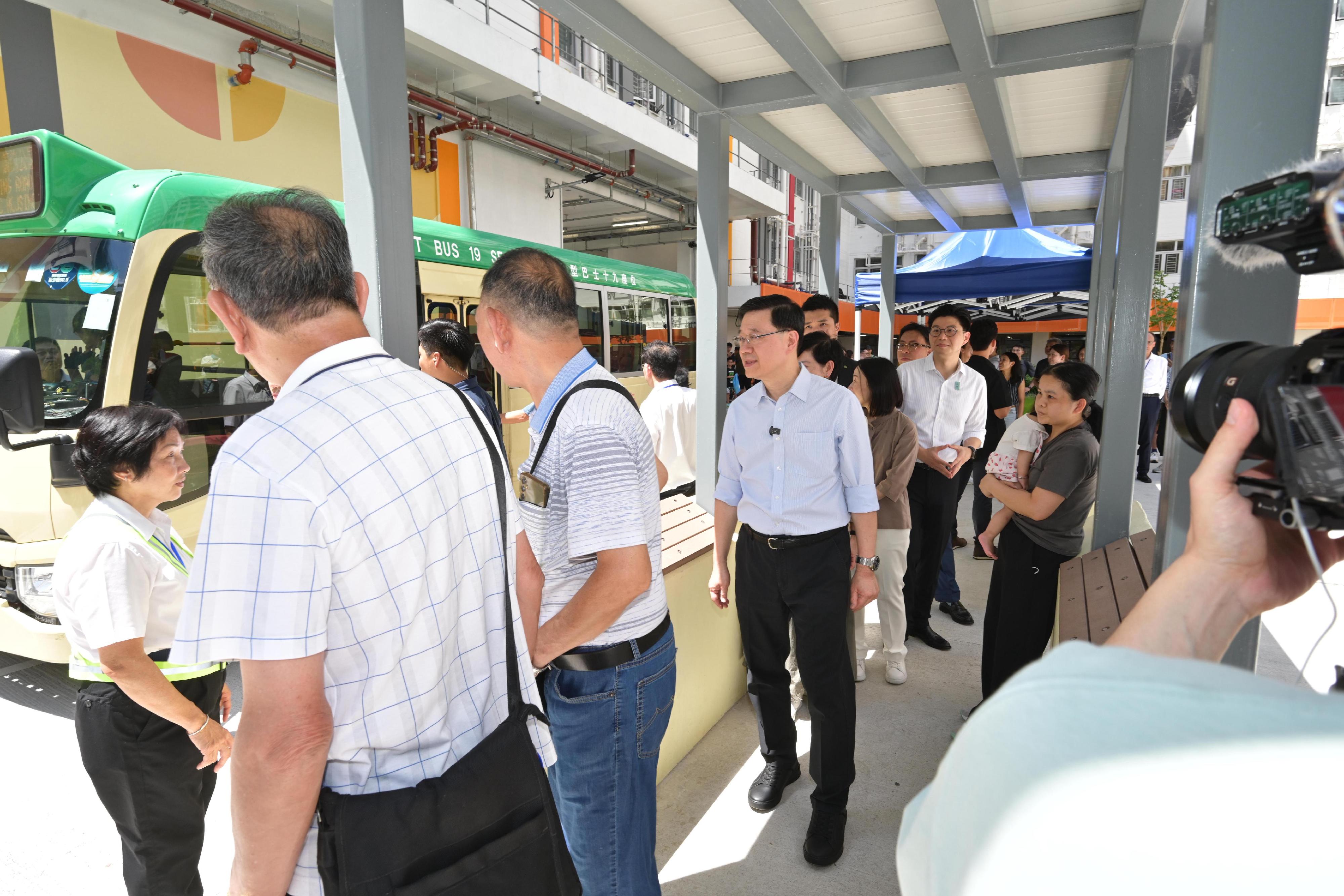 The Chief Executive, Mr John Lee, visited Kwun Tong District today (August 23) to gather public views on the upcoming Policy Address. Photo shows Mr Lee (third left) touring the facilities of the Light Public Housing and interacting with members of the public.
