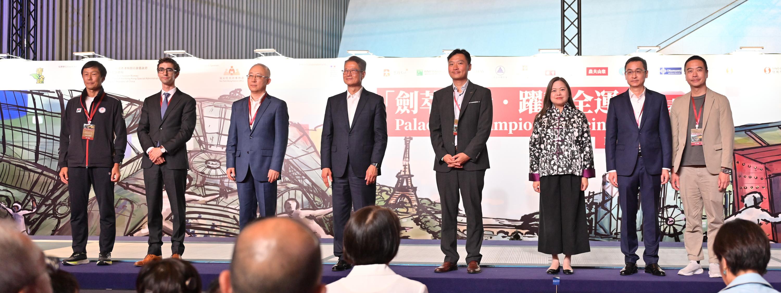 The Financial Secretary, Mr Paul Chan, attended the Palace of Champions: Fencing for Spirit Exhibition Match organised by the GDCD Association today (August 26). Photo shows (from left) the Head of the National Games Coordination Office (Hong Kong), Mr Yeung Tak-keung; the Acting Consul General of France in Hong Kong and Macau, Mr Benjamin Hubin; Deputy Commissioner of the Office of the Commissioner of the Ministry of Foreign Affairs of the People's Republic of China in the Hong Kong Special Administrative Region Mr Li Yongsheng; Mr Chan; the Chairman of the executive committee of the GDCD Association and Legislative Council Member, Mr Vincent Cheng; the Secretary for Culture, Sports and Tourism, Miss Rosanna Law; the Director-General of the Social Work Department of the Liaison Office of the Central People's Government in the Hong Kong Special Administrative Region, Mr Liu Songlin and the District Officer (Yau Tsim Mong), Mr Edward Yu.