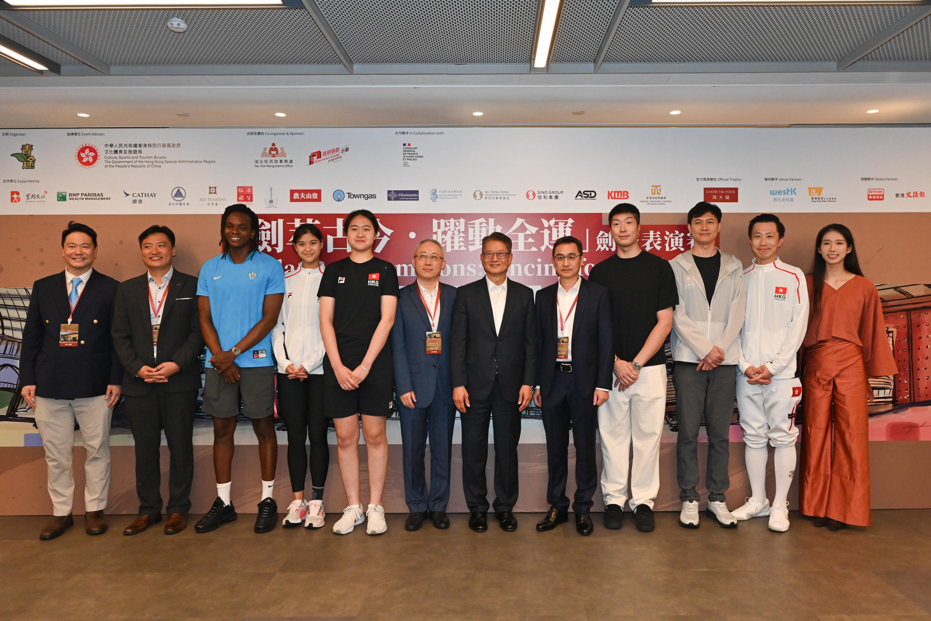 The Financial Secretary, Mr Paul Chan, attended the Palace of Champions: Fencing for Spirit Exhibition Match organised by the GDCD Association today (August 26). Photo shows Mr Chan (sixth right); Deputy Commissioner of the Office of the Commissioner of the Ministry of Foreign Affairs of the People's Republic of China in the Hong Kong Special Administrative Region Mr Li Yongsheng (sixth left); the Director-General of the Social Work Department of the Liaison Office of the Central People's Government in the Hong Kong Special Administrative Region, Mr Liu Songlin (fifth right); the Chairman of the executive committee of the GDCD Association and Legislative Council Member, Mr Vincent Cheng (second left), with other guests and athletes.