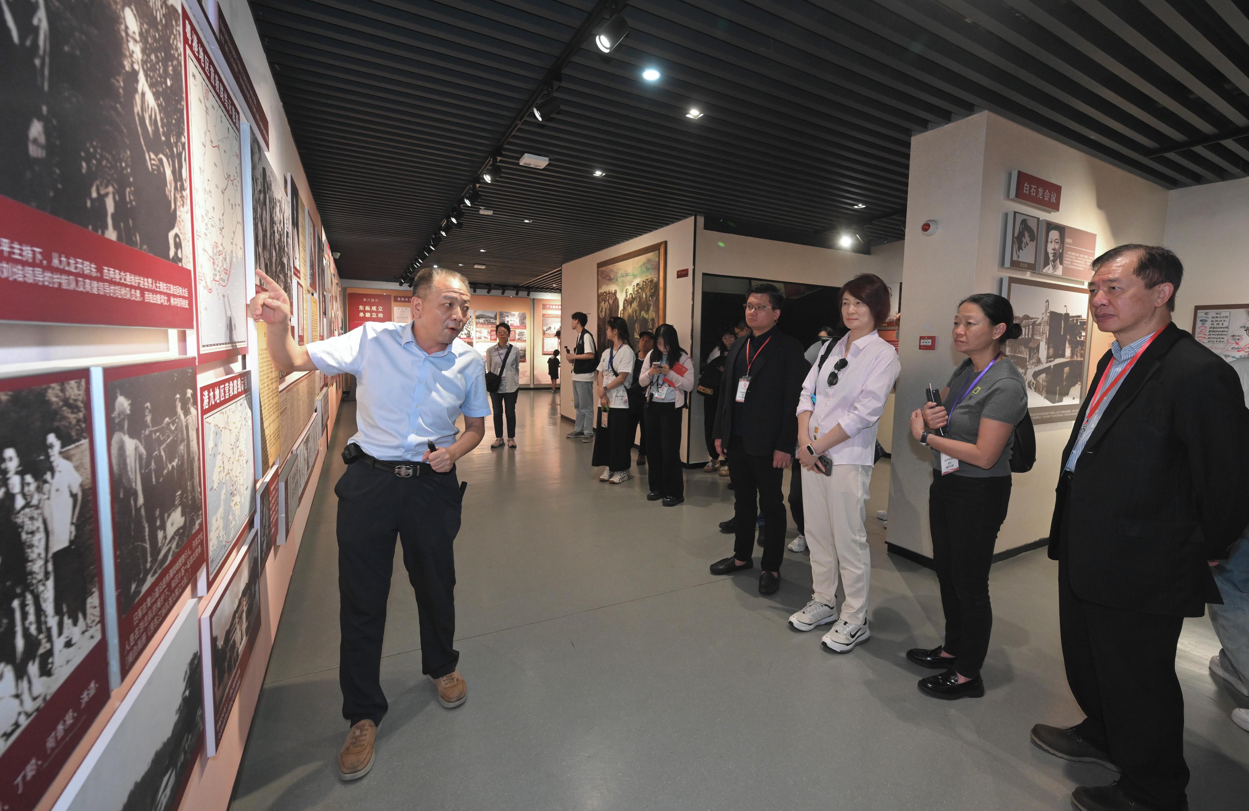 The Working Group on Patriotic Education under the Constitution and Basic Law Promotion Steering Committee organised a two-day study tour themed around the 80th Anniversary of Victory in Chinese People's War of Resistance Against Japanese Aggression and the World Anti-Fascist War yesterday (August 27) and today (August 28) to visit various historical sites and museums in Shenzhen, Dongguan and Guangzhou, with a focus on patriotic devotion to the Chinese nation, gaining a deeper understanding of the gallant efforts of the war martyrs. Photo shows the delegation is being briefed of the heroic deeds of the Dongjiang Column of the Guangdong People's Anti-Japanese Guerrilla Force during the War of Resistance at the Dongjiang Column Memorial Hall at Pingshan, Shenzhen.