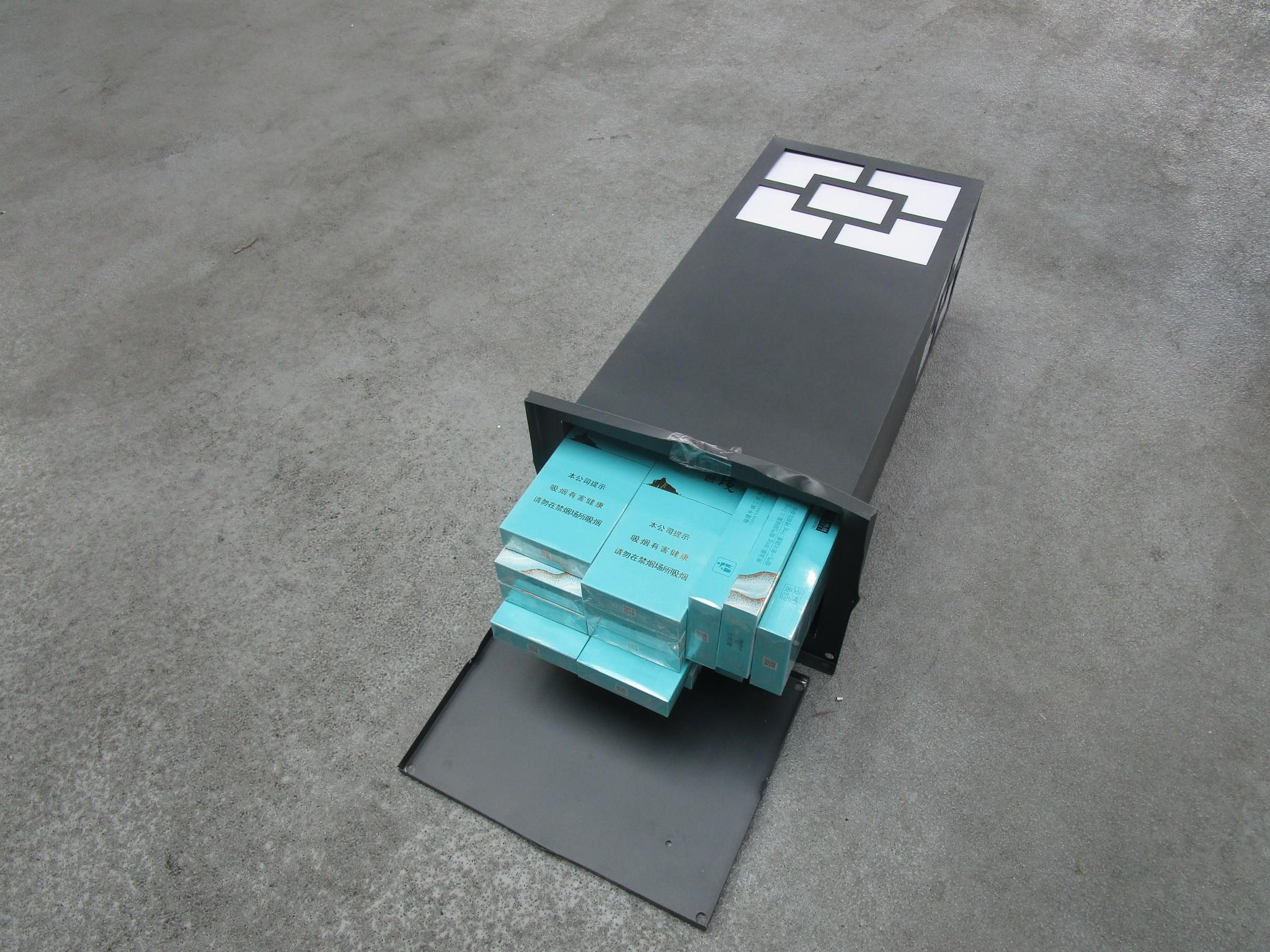 Hong Kong Customs seized about 130 000 suspected illicit cigarettes on August 20, with an estimated market value of about $620,000 and a duty potential of about $450,000, at the Inbound Cargo Examination Building of the Hong Kong-Zhuhai-Macao Bridge Hong Kong Port. Photo shows suspected illicit cigarettes concealed inside a light box.