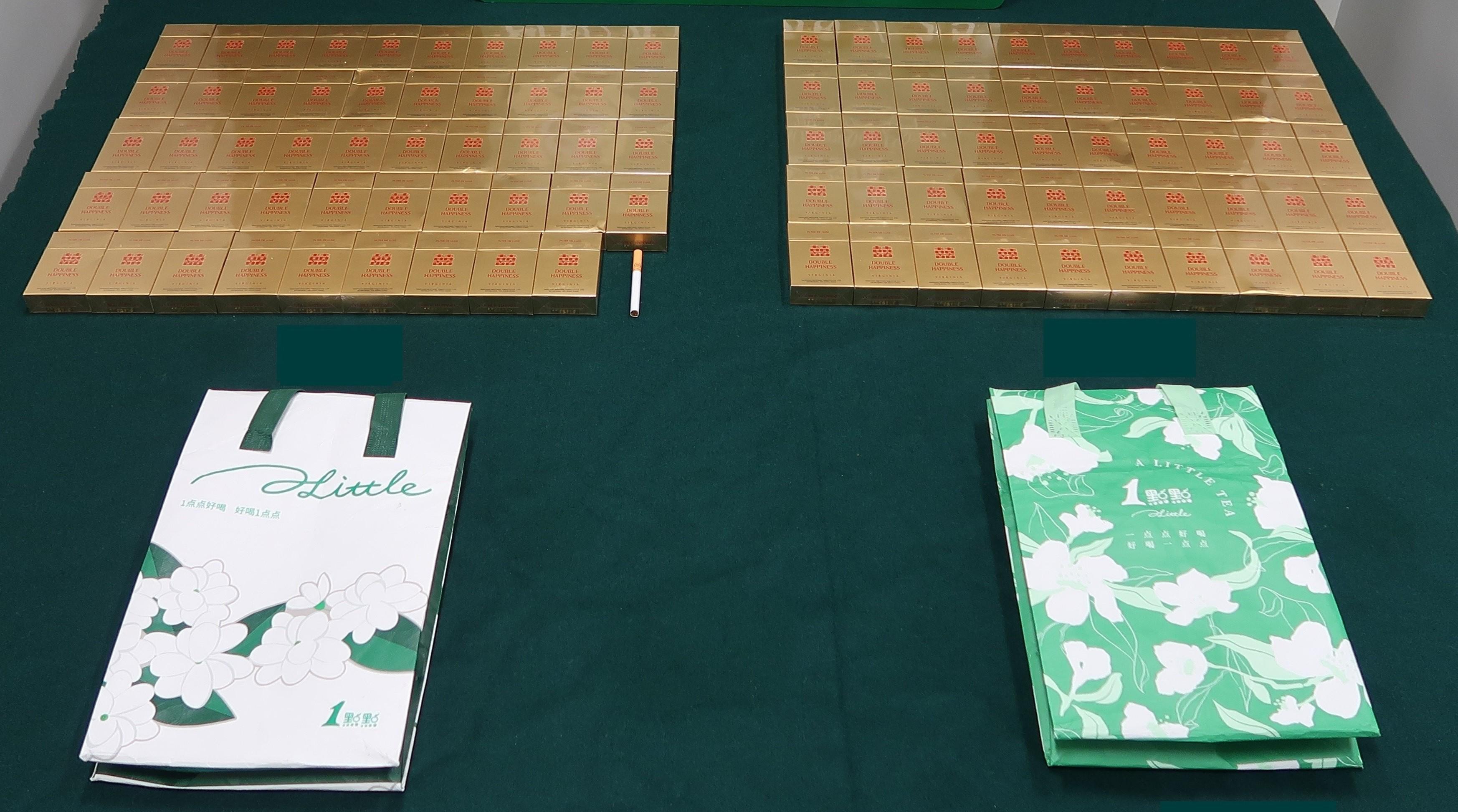 A 52-year-old female incoming passenger was sentenced to 14 weeks' imprisonment at the Fanling Magistrates' Courts today (August 29) for possessing duty-not-paid cigarettes and failing to declare them to Customs officers, in contravention of the Dutiable Commodities Ordinance. Photo shows the duty-not-paid cigarettes seized in the thermal bags carried by her.