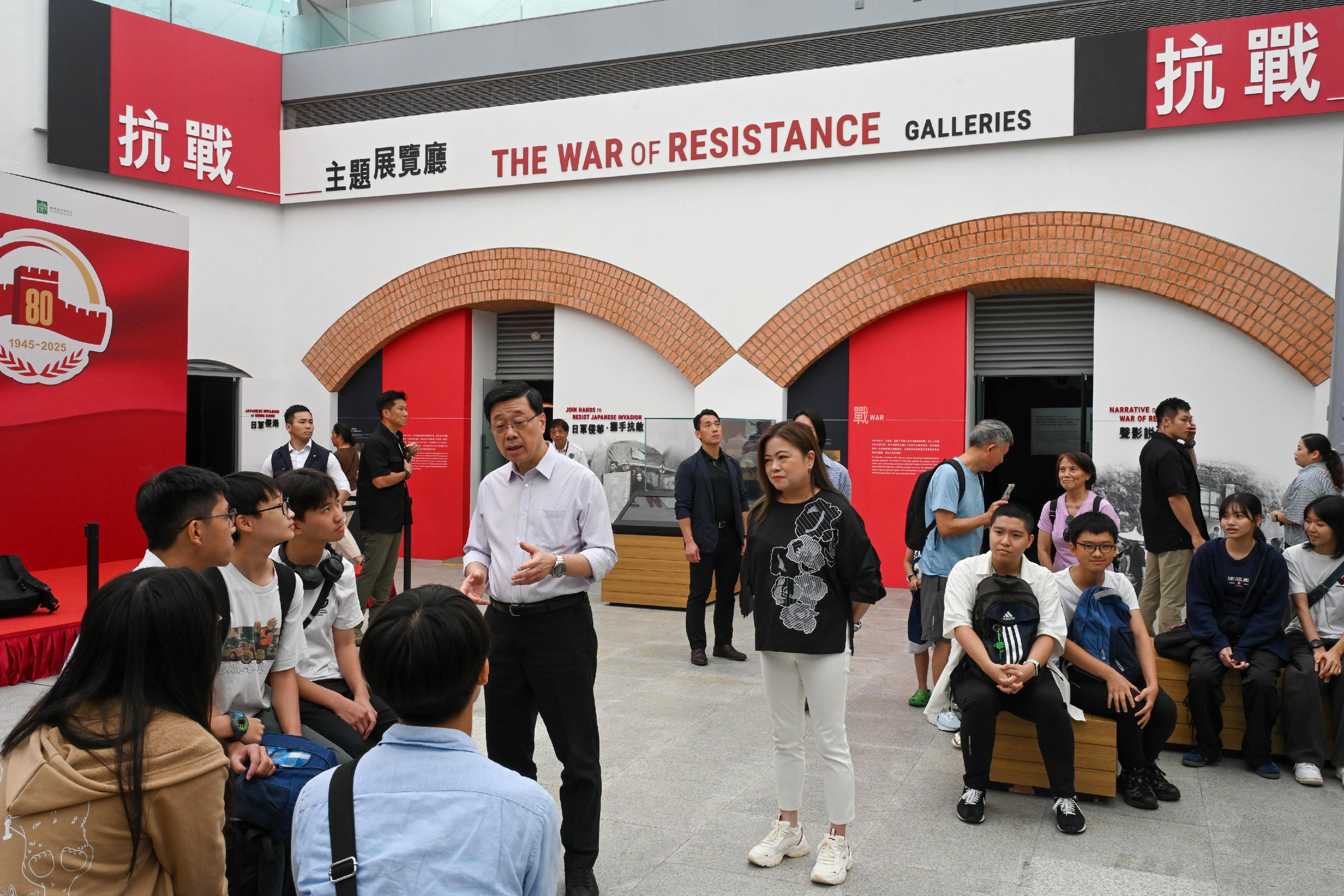 The Chief Executive, Mr John Lee, visited Eastern District today (August 30) to gather public views on the upcoming Policy Address. Photo shows Mr Lee, accompanied by the Secretary for Culture, Sports and Tourism, Miss Rosanna Law, visiting the Hong Kong Museum of the War of Resistance and Coastal Defence and interacting with members of the public on-site.
