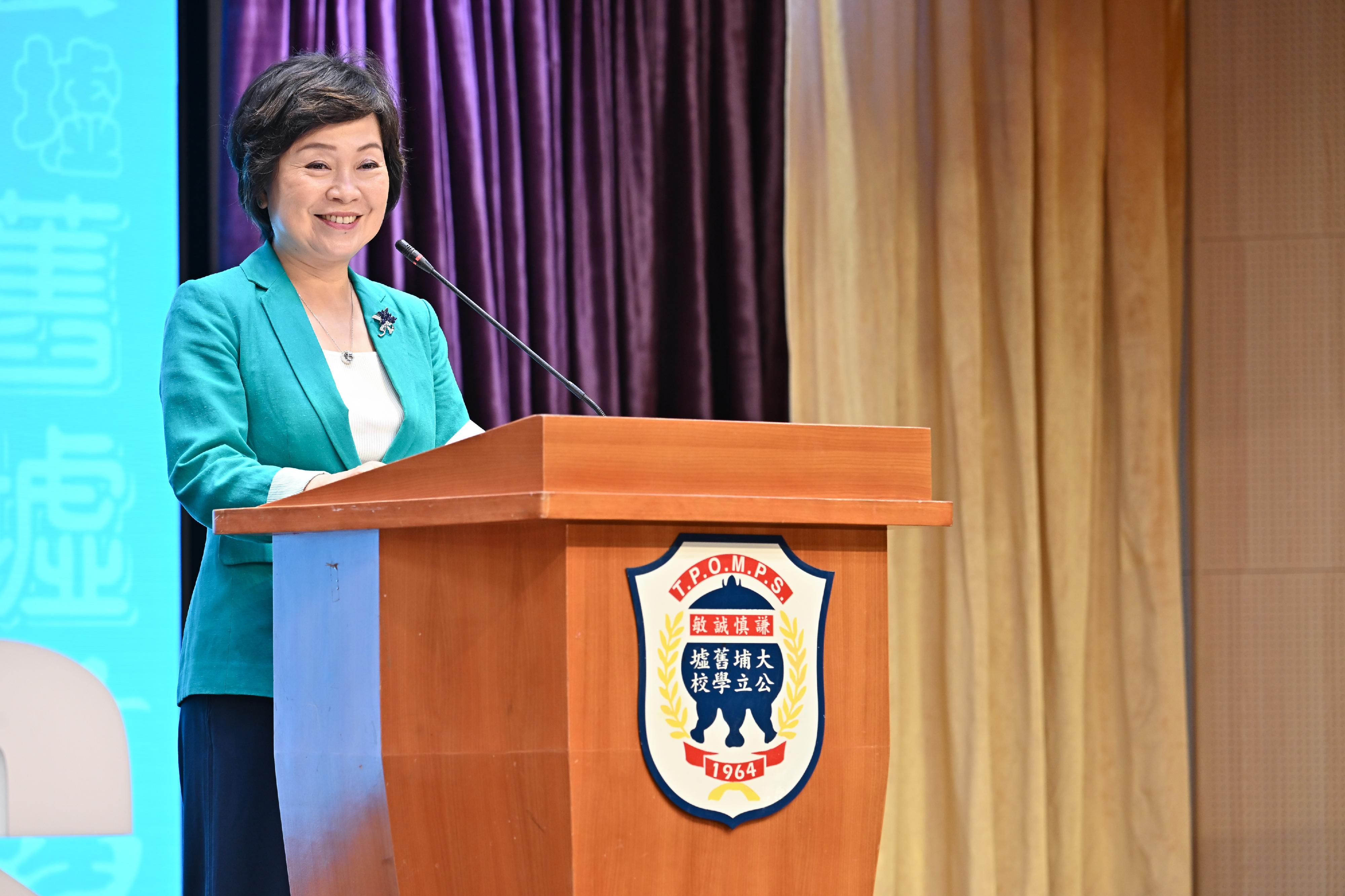 The Secretary for Education, Dr Choi Yuk-lin, speaks at the school opening ceremony of Tai Po Old Market Public School today (September 1).