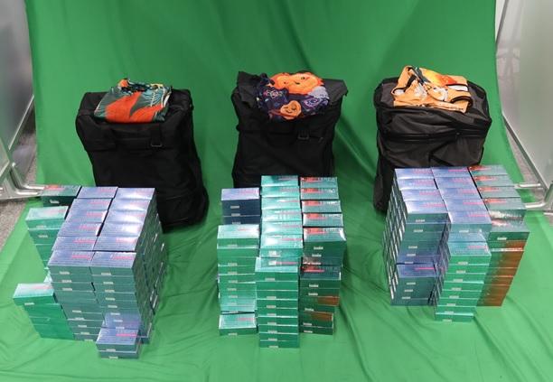 Three incoming passengers were sentenced to six months' imprisonment at the West Kowloon Magistrates' Courts today (September 1) for importing alternative smoking products, in contravention of the Import and Export Ordinance. Photo shows the alternative smoking products seized.