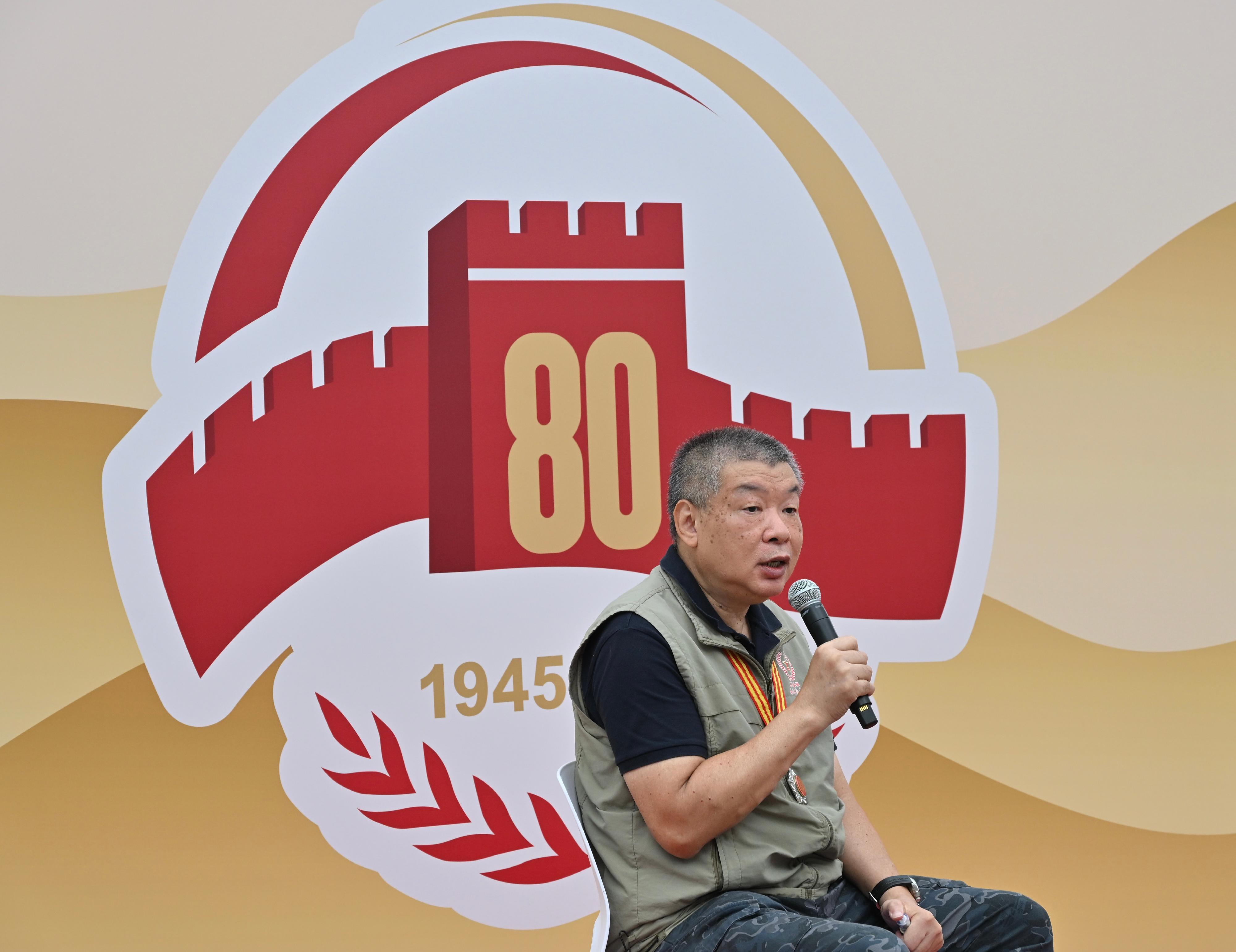 Today (September 3) is the Victory Day of the Chinese People's War of Resistance Against Japanese Aggression. The Hong Kong Museum of the War of Resistance and Coastal Defence held a sharing session on the War of Resistance. Photo shows the Deputy President of the Society of Veterans of the Original Hong Kong Independent Battalion of the Dongjiang Column, Mr Lam Ming, hosting a sharing session with local secondary students. 
