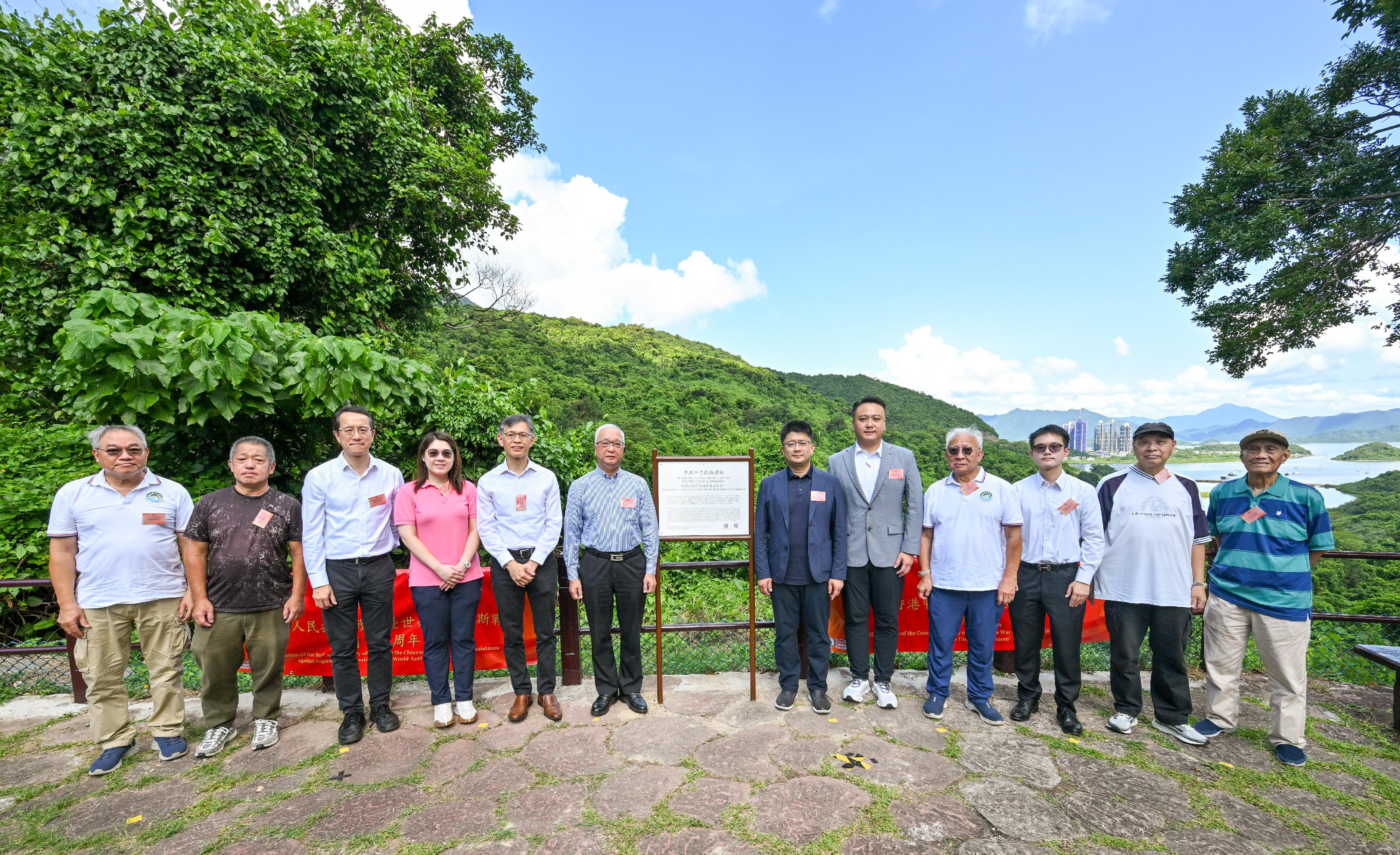 The Agriculture, Fisheries and Conservation Department today (September 5) held an unveiling ceremony for a commemorative plaque at a historic site of the Communist Party of China in the War of Resistance in Hong Kong at Sai Sha Road, Kei Ling Ha, Sai Kung in Ma On Shan Country Park, commemorating the 80th Anniversary of the Victory in the Chinese People's War of Resistance Against Japanese Aggression and the World Anti-Fascist War. Photo shows (from third left) the Deputy Director of Agriculture, Fisheries and Conservation, Mr Patrick Lai; Legislative Council Member Ms Lam So-wai; the Director of Agriculture, Fisheries and Conservation, Mr Mickey Lai; the Secretary for Environment and Ecology, Mr Tse Chin-wan; Deputy Director-General of the New Territories Sub-office of the Liaison Office of the Central People's Government in the Hong Kong Special Administrative Region Mr Wang Hui; Legislative Council Member Mr Stanley Li; the First Vice-Chairman of the Sai Kung North Rural Committee, Mr Lam B, and other guests in front of the commemorative plaque. 