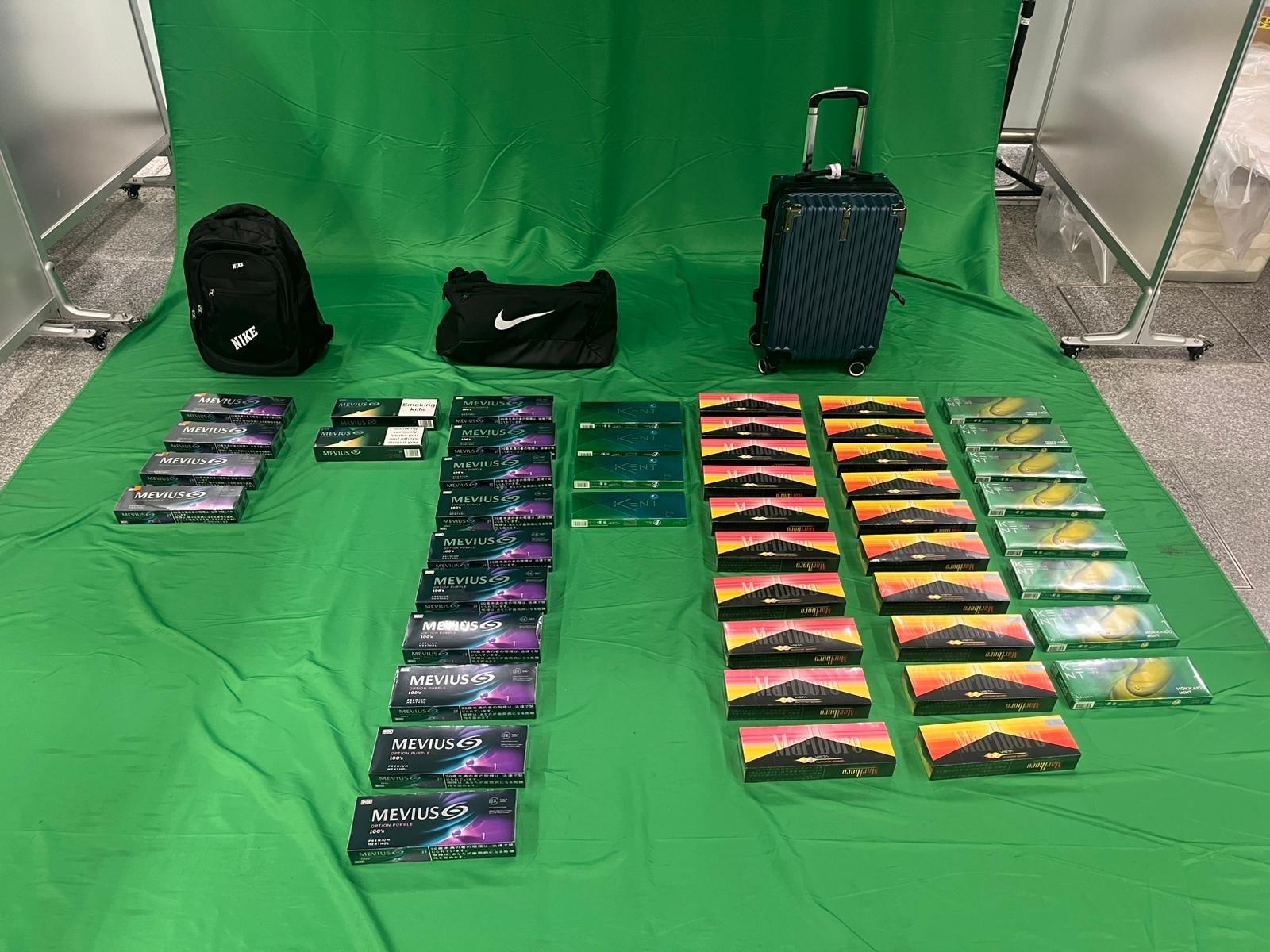 An incoming female passenger was sentenced to four months’ imprisonment and fined $1,500 at the Kowloon City Magistrates' Courts today (September 6) for possessing duty-not-paid cigarettes and failing to declare them to Customs officers, in contravention of the Dutiable Commodities Ordinance. Photo shows the duty-not-paid cigarettes seized.
