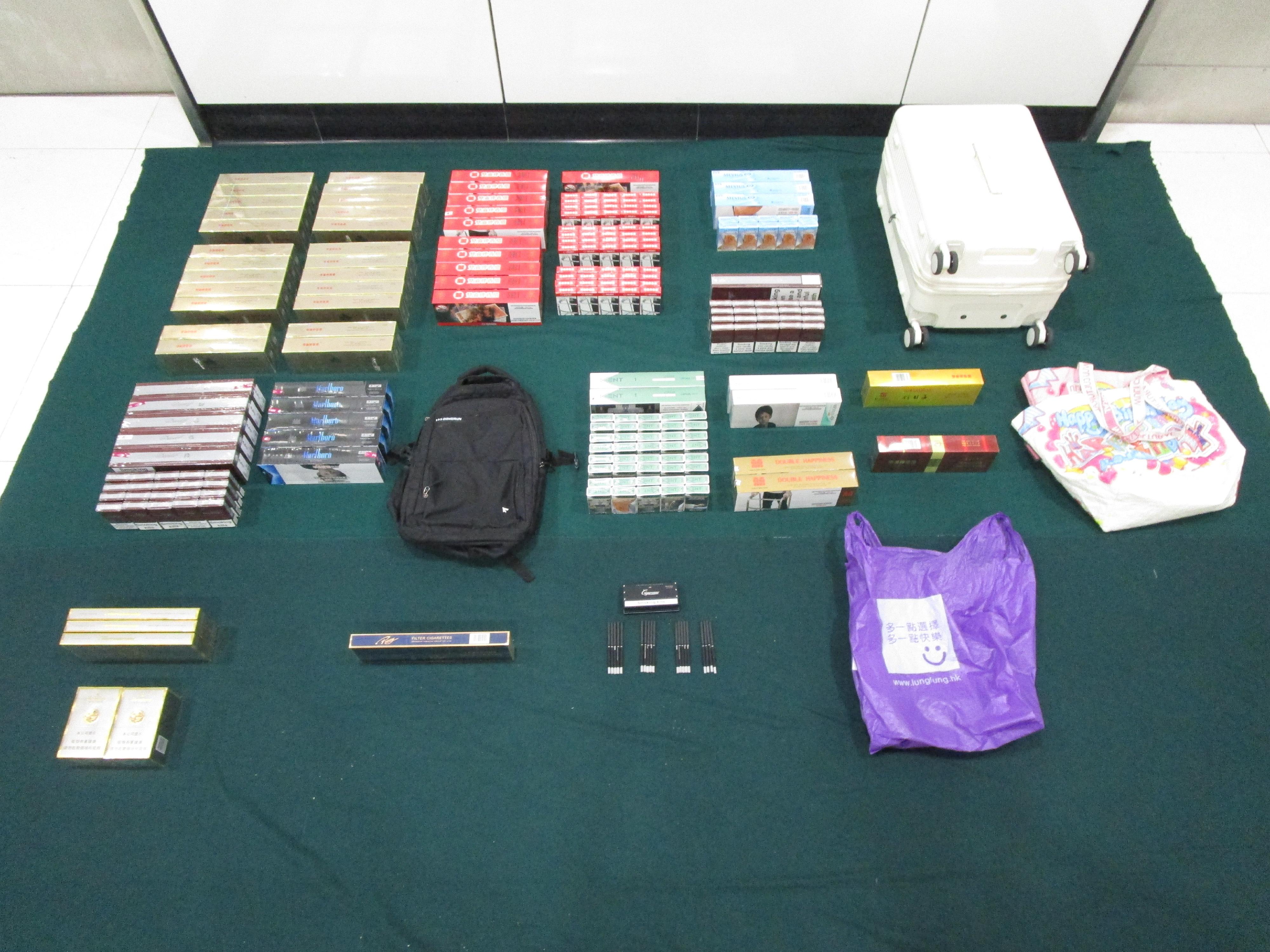 An incoming 59-year-old female passenger was sentenced to six weeks' imprisonment and fined $1,500 at the Fanling Magistrates' Courts today (September 6) for possessing duty-not-paid cigarettes and failing to declare to Customs officers, in contravention of the Dutiable Commodities Ordinance. Photo shows the duty-not-paid cigarettes seized.