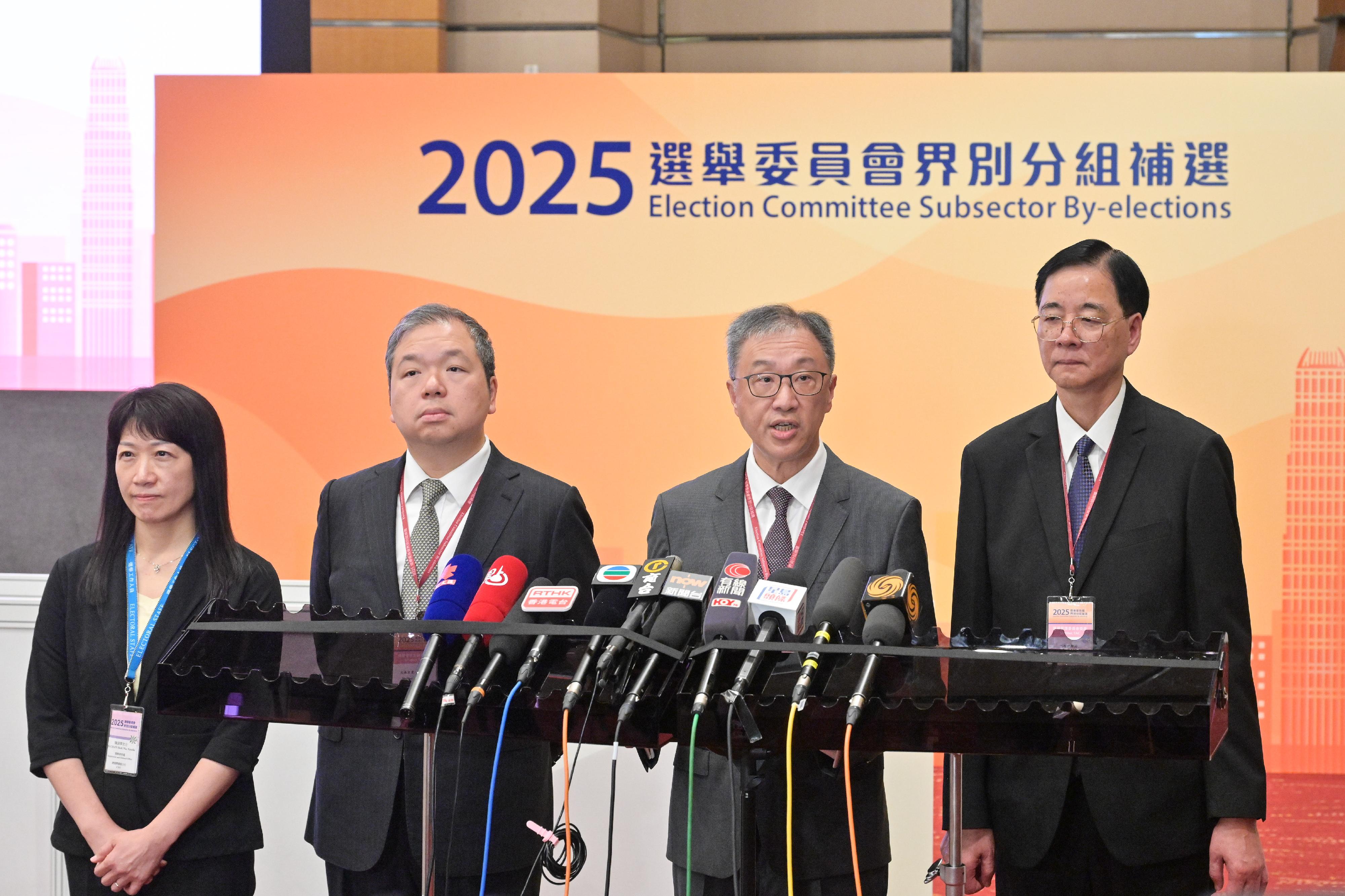 The Chairman of the Electoral Affairs Commission (EAC), Mr Justice David Lok (second right); EAC members Professor Daniel Shek (first right) and Mr Bernard Man, SC (second left), and the Chief Electoral Officer of the Registration and Electoral Office, Ms Natalie Chan (first left), meet the media this morning (September 7) at the Media Centre of the 2025 Election Committee Subsector By-elections located at the Hong Kong Convention and Exhibition Centre.