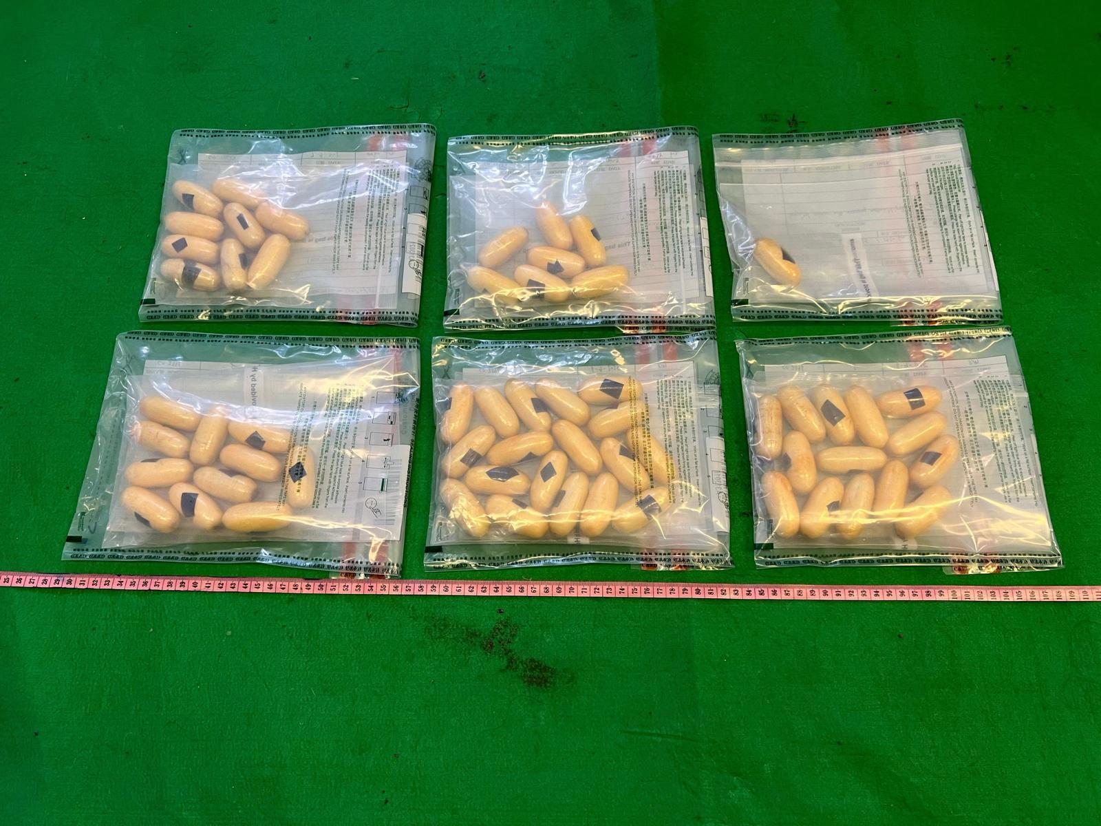 Hong Kong Customs on September 5 and yesterday (September 6) detected two drug trafficking cases involving air passengers at Hong Kong International Airport and seized a total of about 1.3 kilograms of suspected cocaine and 12 kilograms of suspected cannabis buds with a total estimated market value over $3.7 million.  Photo shows the suspected cocaine seized.