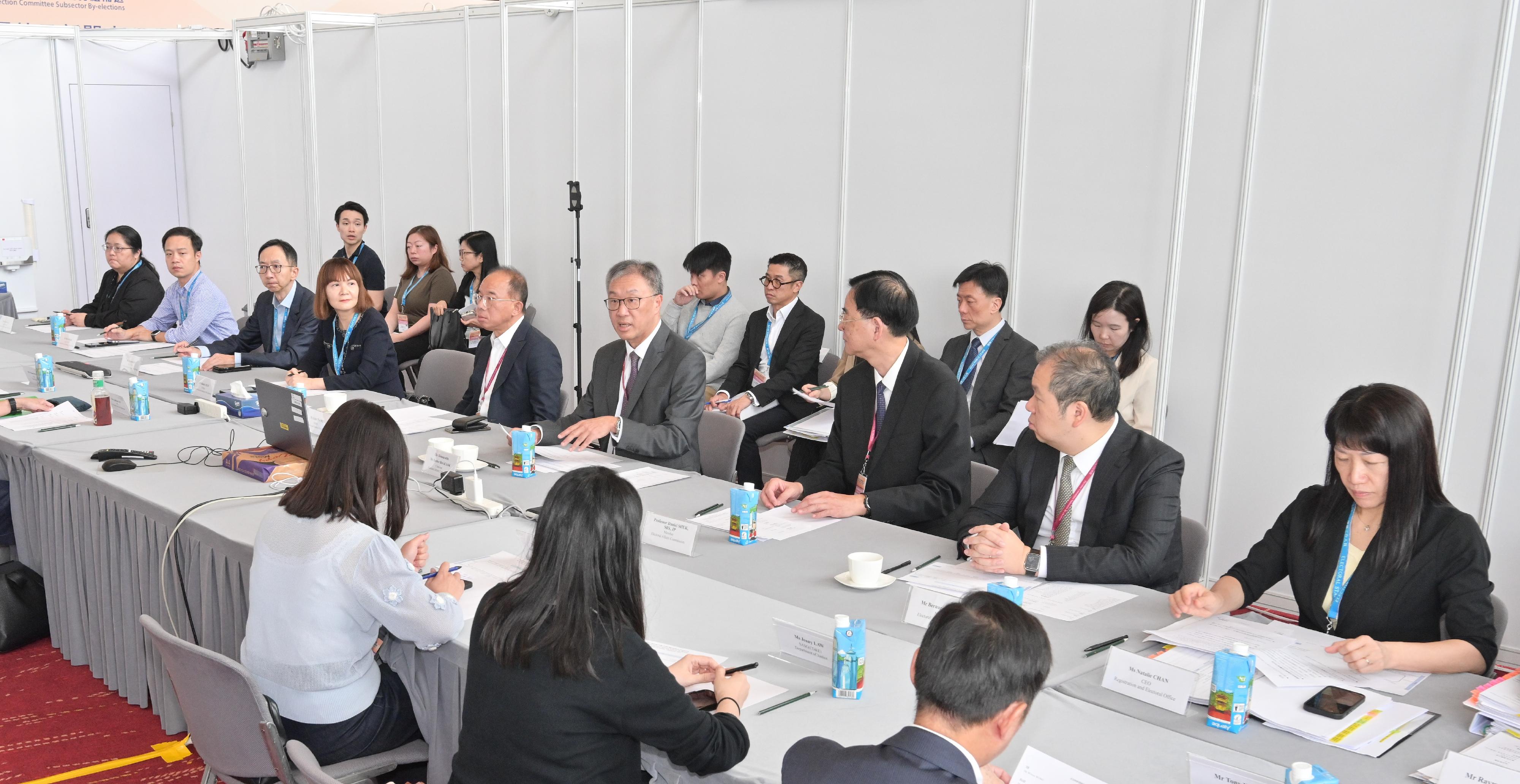 The Chairman of the Electoral Affairs Commission (EAC), Mr Justice David Lok, chaired the second meeting of the Crisis Management Committee this afternoon (September 7) to closely monitor the conduct of the 2025 Election Committee Subsector By-elections in real time. Photo shows (front row, from fifth left) the Secretary for Constitutional and Mainland Affairs, Mr Erick Tsang Kwok-wai; Mr Justice Lok; EAC members Professor Daniel Shek and Mr Bernard Man, SC, attending the meeting with representatives of relevant bureaux/departments.