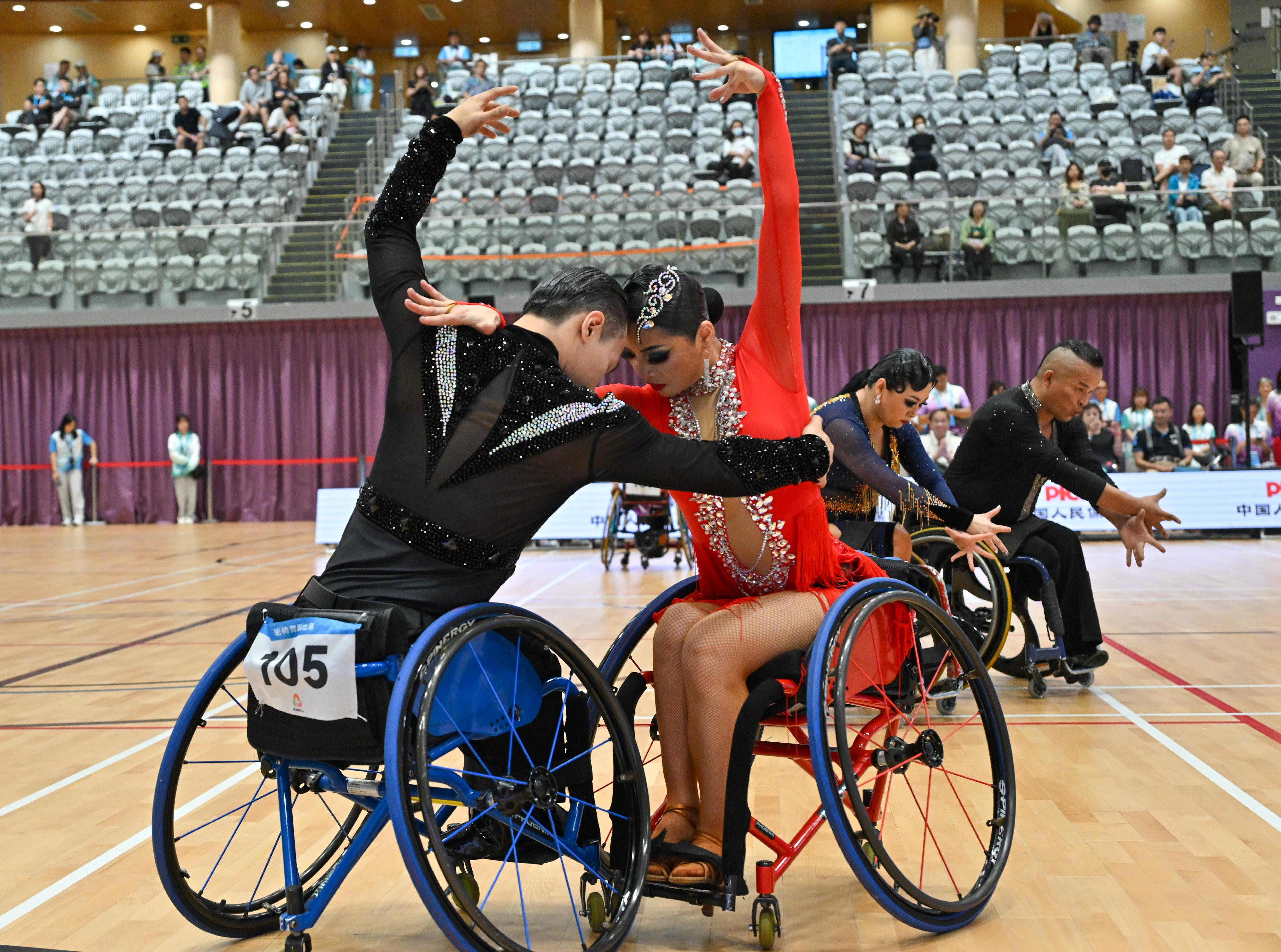 The mass participation para dance sport competition of the 12th National Games for Persons with Disabilities and the 9th National Special Olympic Games was held at Ma On Shan Sports Centre today (September 6). Photo shows athletes participating in the competition.