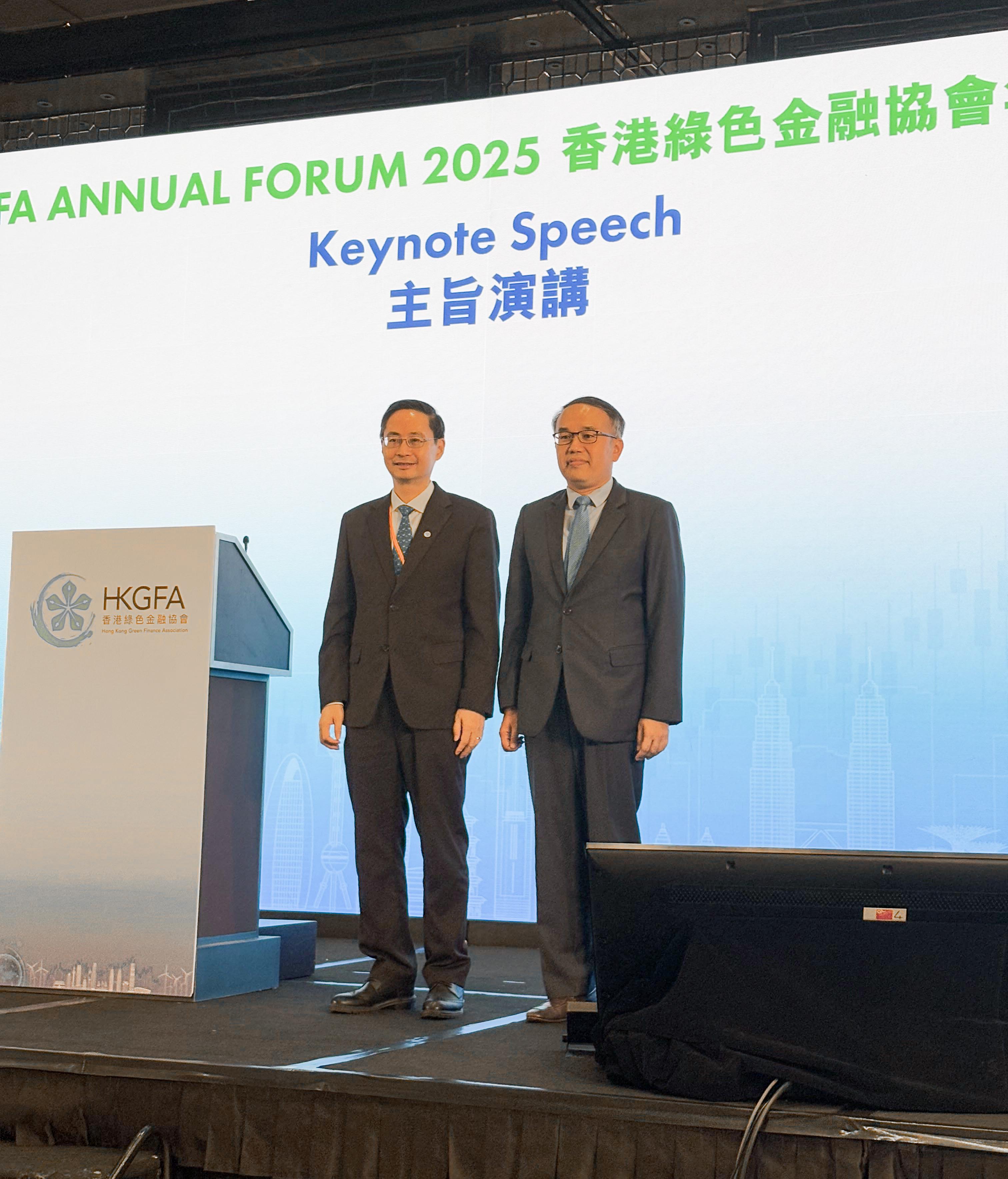 The Secretary for Financial Services and the Treasury, Mr Christopher Hui (right), is pictured with the Chairman and President of the Hong Kong Green Finance Association (HKGFA), Dr Ma Jun (left), at the 2025 HKGFA Annual Forum today (September 8).