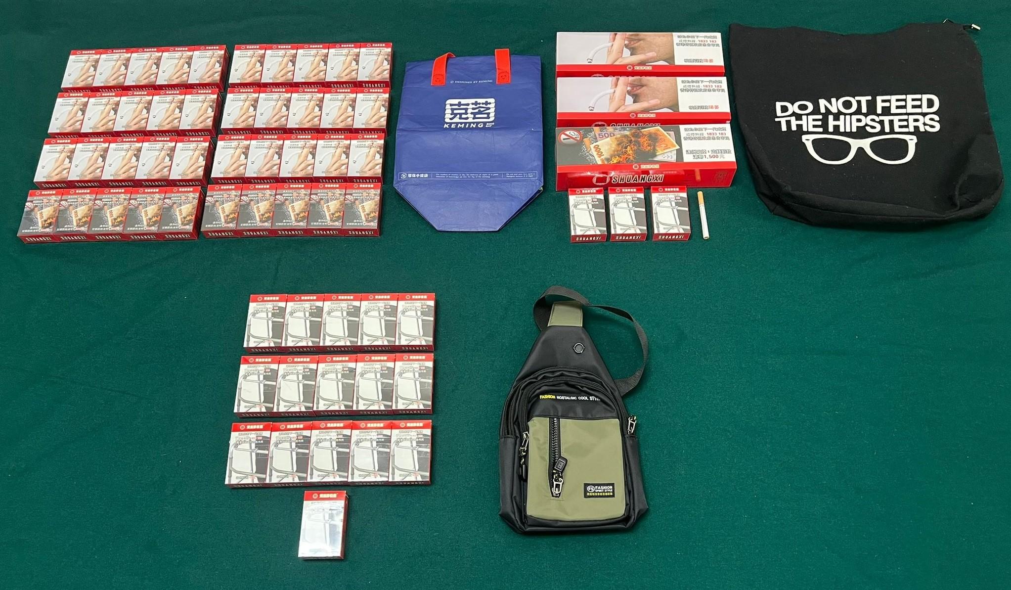 An incoming 83-year-old male passenger was sentenced to four weeks' imprisonment and fined $1,200 at the Fanling Magistrates' Courts today (September 9) for possessing 1,781 sticks of duty-not-paid cigarettes and failing to declare them to Customs officers, in contravention of the Dutiable Commodities Ordinance. Photo shows the duty-not-paid cigarettes seized.