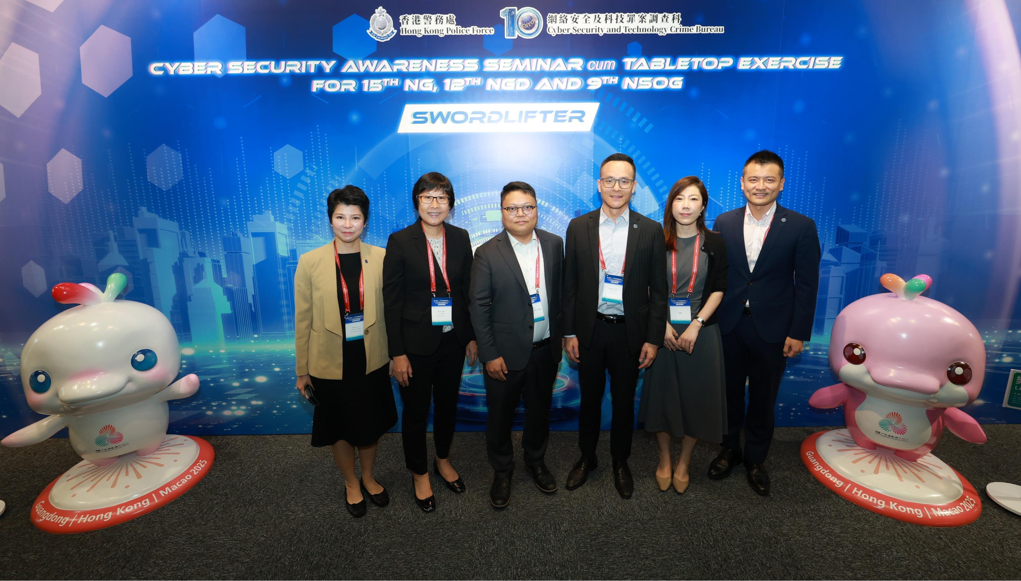 The Cyber Security and Technology Crime Bureau of the Hong Kong Police Force conducted the Cyber Security Seminar cum Tabletop Exercise, codenamed SWORDLIFTER, at the Police Headquarters today (September 9). Photo shows the Assistant Commissioner of Police (Crime), Ms Chung Wing-man (second left) with other guests at the seminar.