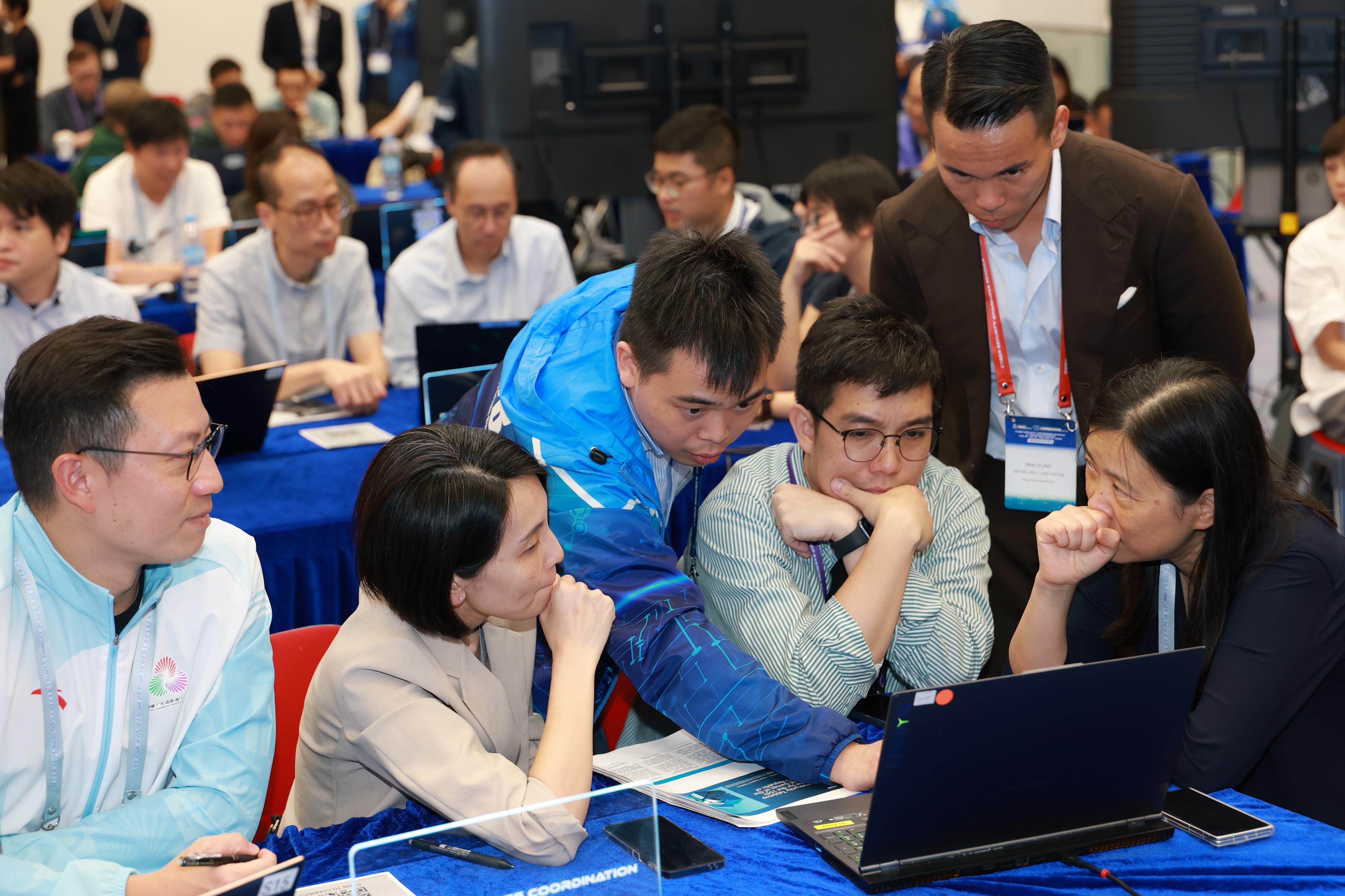 The Cyber Security and Technology Crime Bureau of the Hong Kong Police Force conducted the Cyber Security Seminar cum Tabletop Exercise, codenamed SWORDLIFTER, at the Police Headquarters today (September 9). Photo shows participants taking part in the cross-sector Tabletop Exercise.