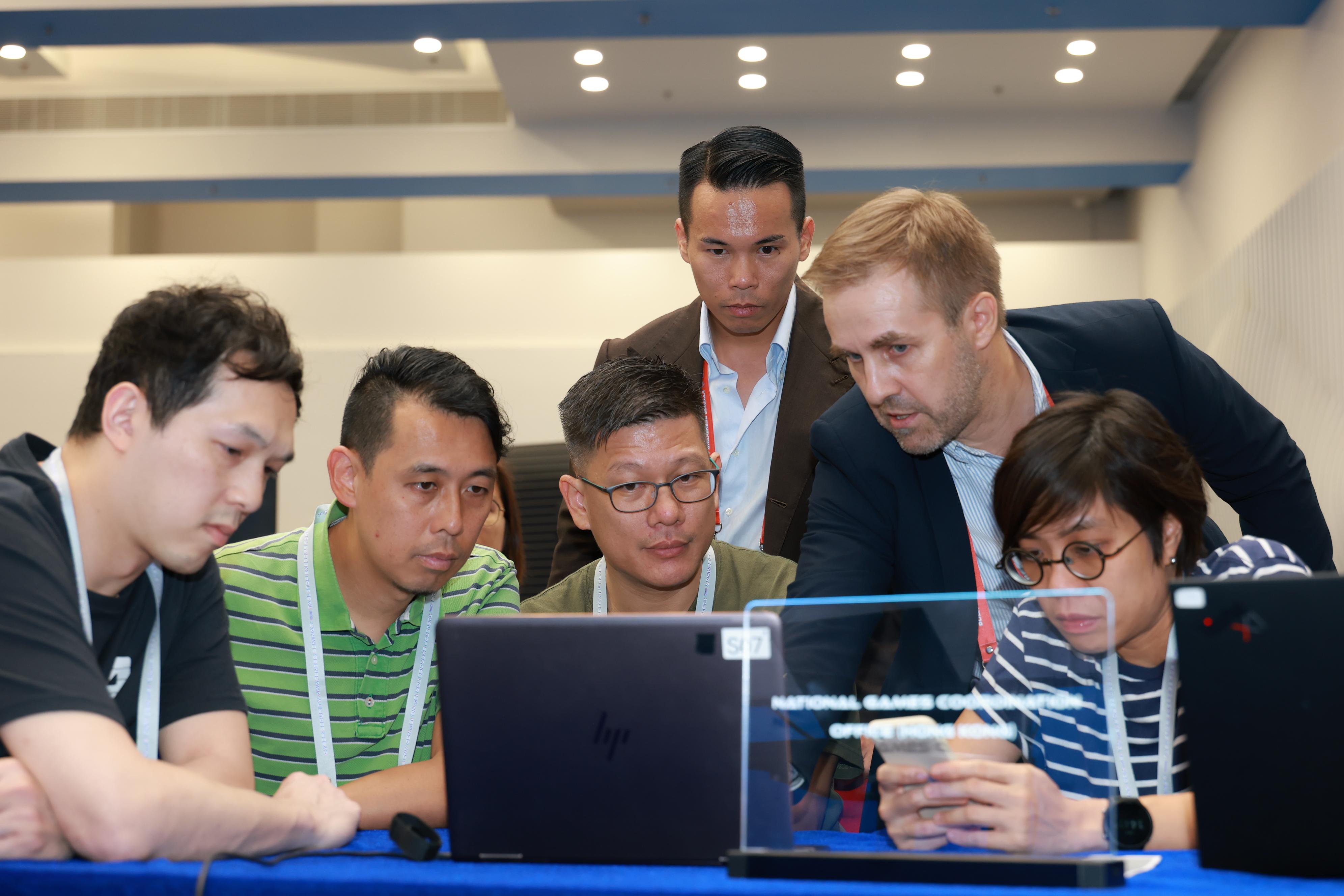 The Cyber Security and Technology Crime Bureau of the Hong Kong Police Force conducted the Cyber Security Seminar cum Tabletop Exercise, codenamed SWORDLIFTER, at the Police Headquarters today (September 9). Photo shows participants taking part in the cross-sector Tabletop Exercise.