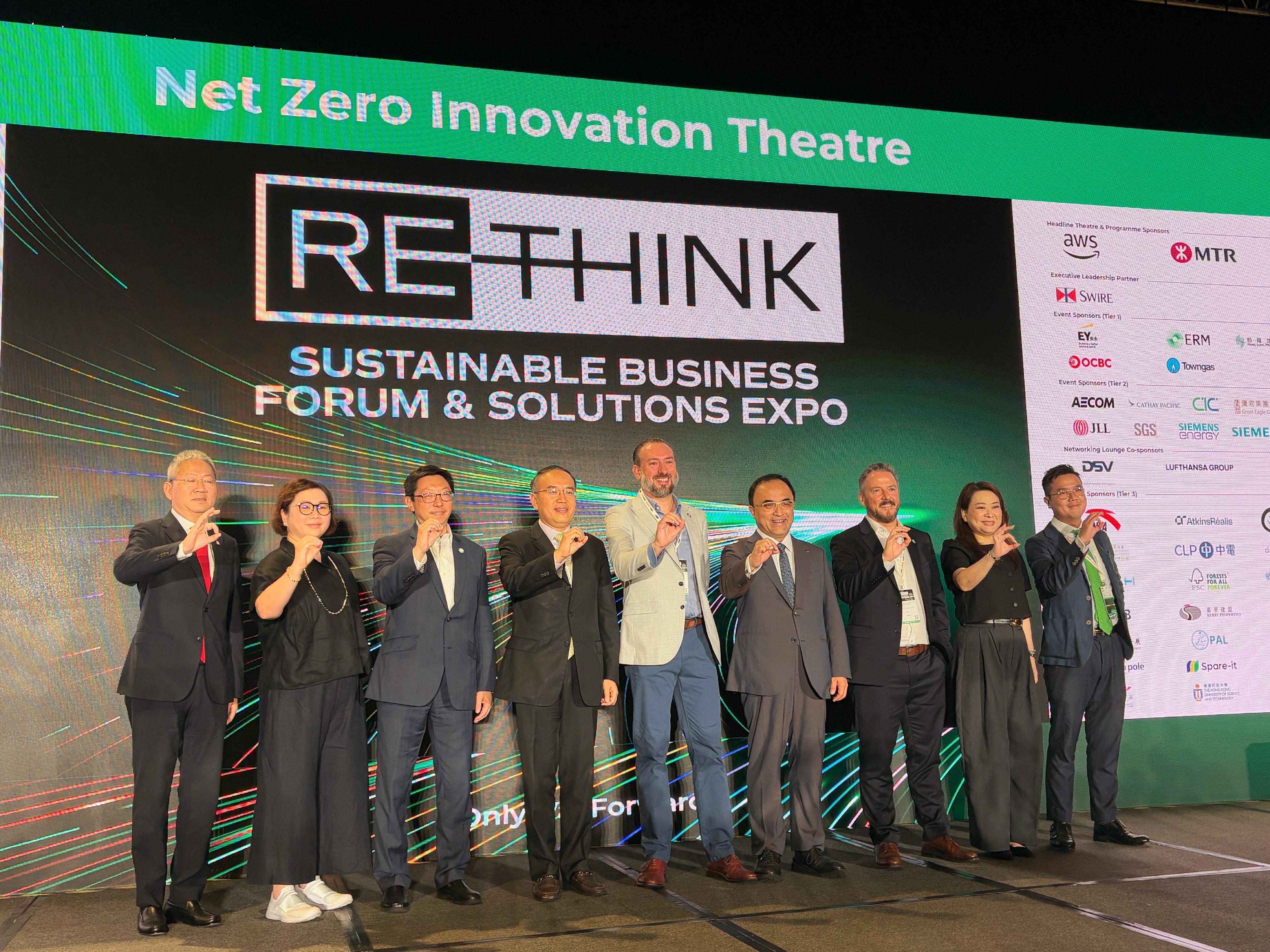 The Secretary for Financial Services and the Treasury, Mr Christopher Hui (fourth left), together with the Founder & CEO of ReThink HK & The ReThink Foundation, Mr Chris Brown (centre), the Chief Executive Officer of Business Environment Council, Mr Simon Ng (third left), and other guests, gestured a "zero" sign to show their determination in achieving net zero carbon emissions at the ReThink HK 2025 today (September 12). 