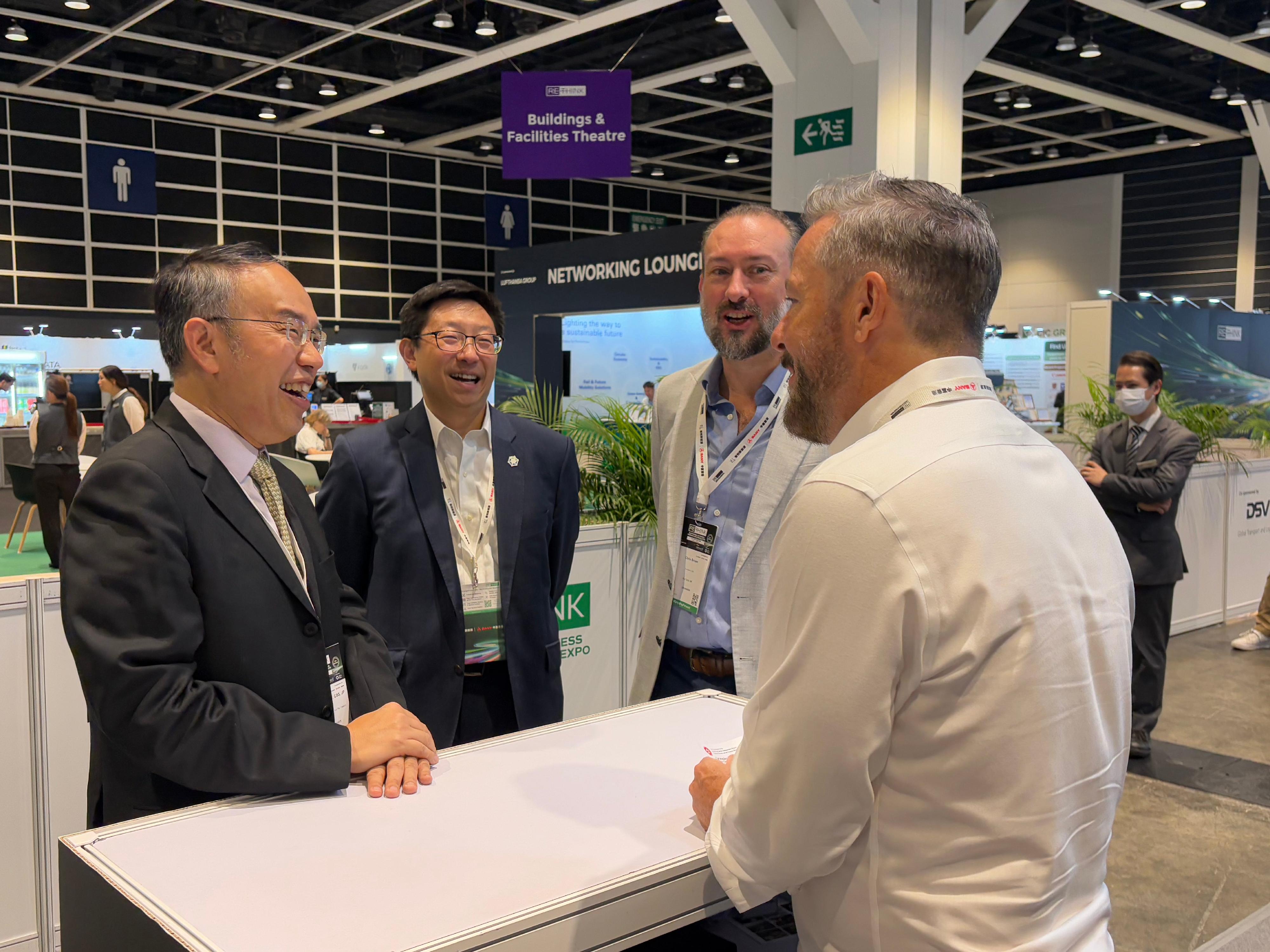 The Secretary for Financial Services and the Treasury, Mr Christopher Hui (first left), chatted with an exhibitor during his tour at the ReThink HK 2025 today (September 12). Next to him are the Founder & CEO of ReThink HK & The ReThink Foundation, Mr Chris Brown (second right), and the Chief Executive Officer of Business Environment Council, Mr Simon Ng (second left).