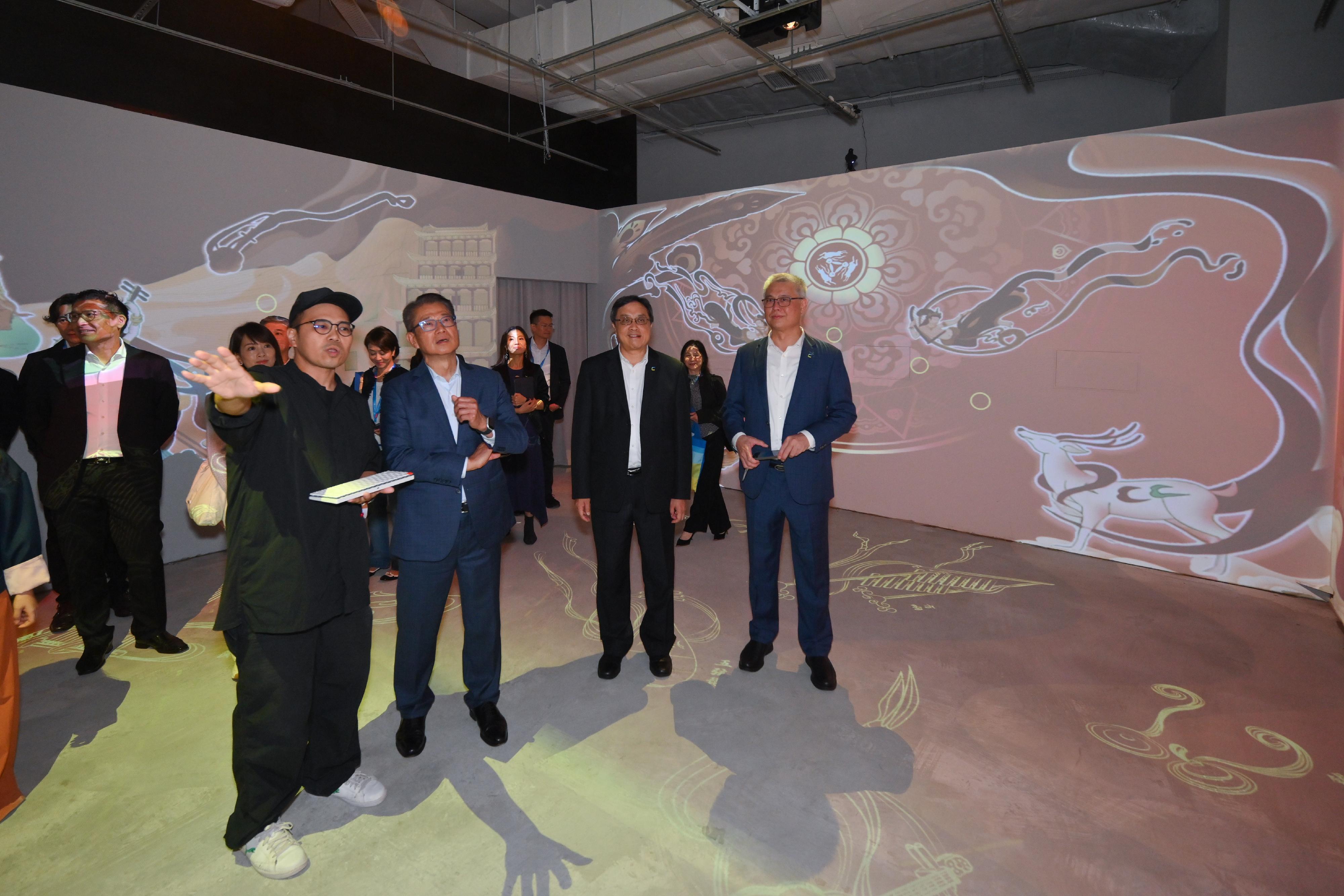 The Financial Secretary, Mr Paul Chan, attended the Digital Entertainment Leadership Forum 2025 today (September 12). Photo shows Mr Chan (front row, second left) touring the experience zones.
