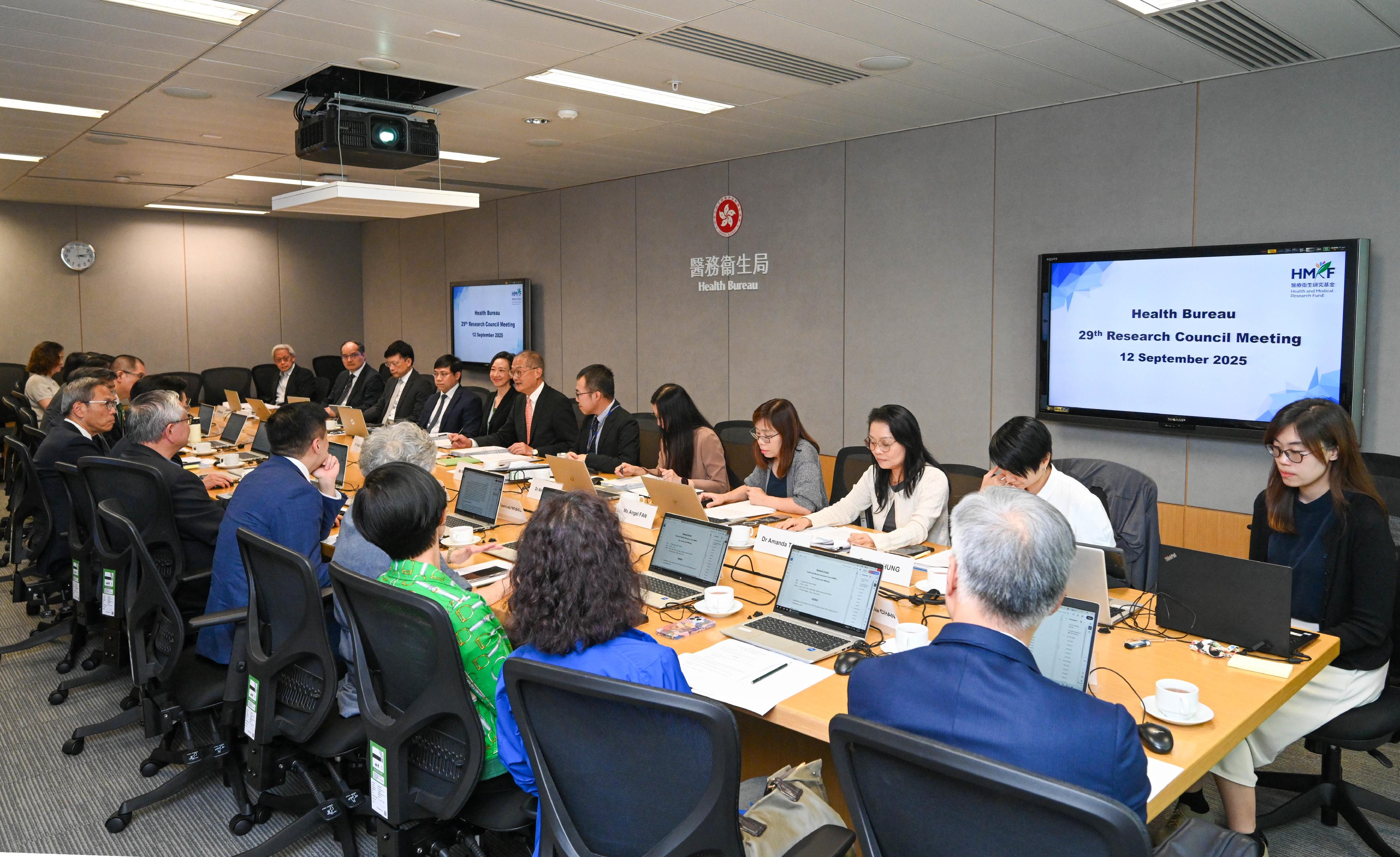 The Secretary for Health, Professor Lo Chung-mau (sixth left), chairs the 29th meeting of the Research Council under the Health Bureau today (September 12). The Under Secretary for Health, Dr Cecilia Fan (fifth left), and Deputy Secretary for Health Mr Raymond Wu (sixth right) also attend.
