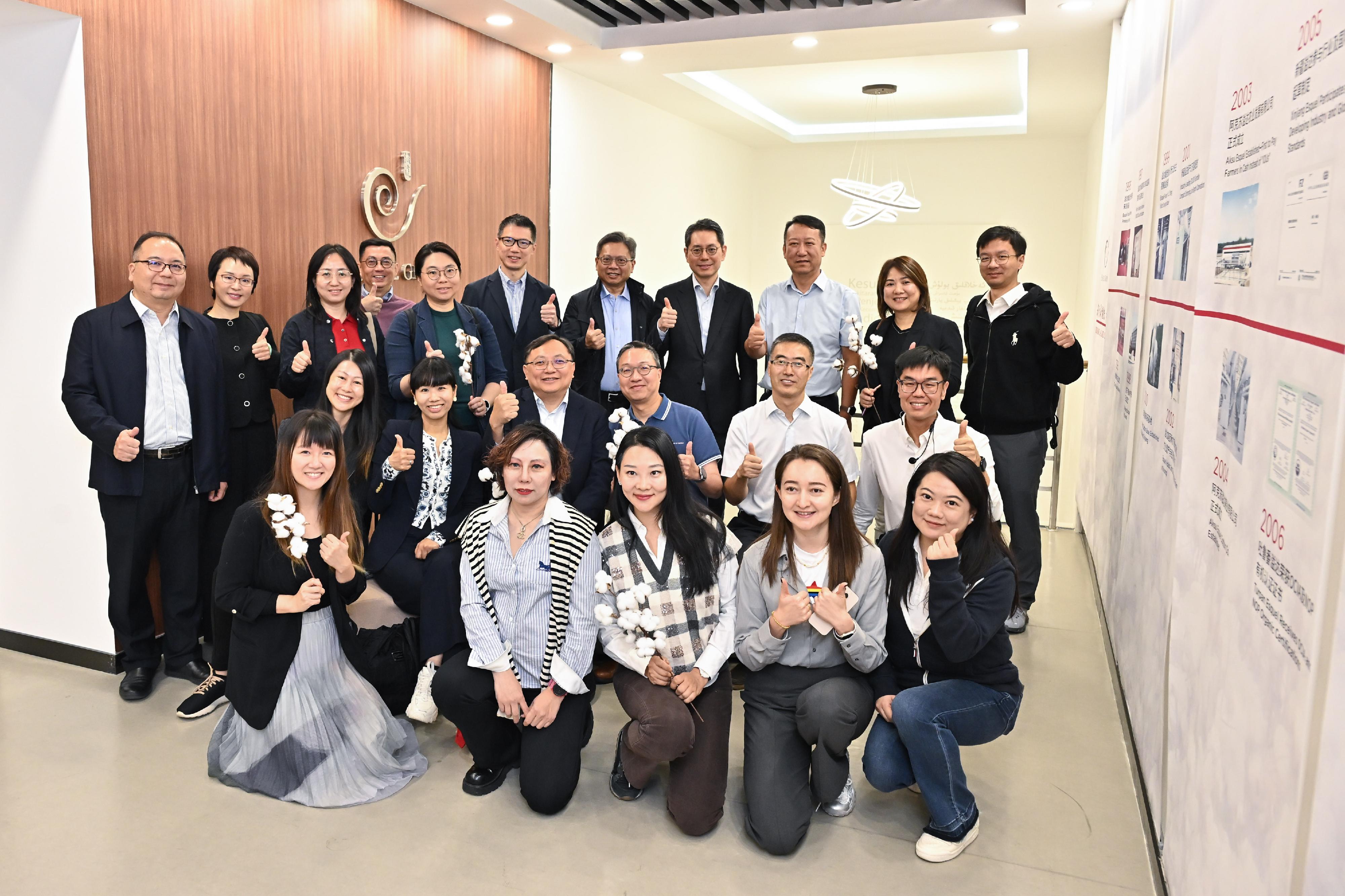 The Secretary for Justice, Mr Paul Lam, SC, leading a cross-professional delegation to visit Urumqi, Xinjiang today (September 13). Photo shows Mr Lam (second row, third right) and the delegation with representatives of a Hong Kong-invested enterprise in Urumqi.