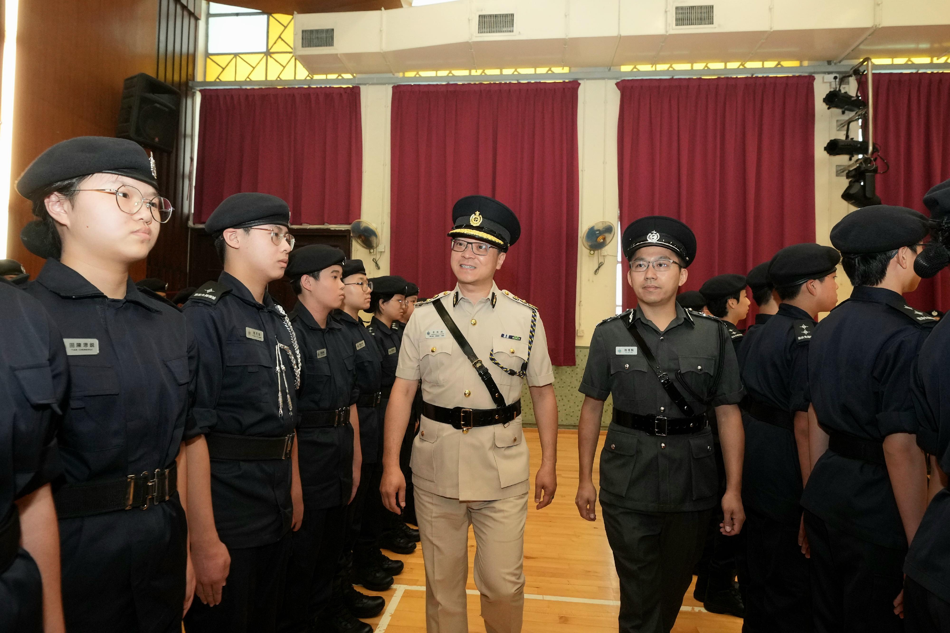The Correctional Services Department today (September 14) held the Correctional Services Pioneer Leaders (CSPL) Launching Ceremony and Trainees Promotion Ceremony, marking a new milestone for the Department's community education work. Photo shows the Commissioner of Correctional Services, Mr Wong Kwok-hing (second right), accompanied by the Honorary Director of the CSPL Honorary Advisory Committee, Mr Sunny Sy (first right), inspecting a contingent of the promoted CSPL trainees.