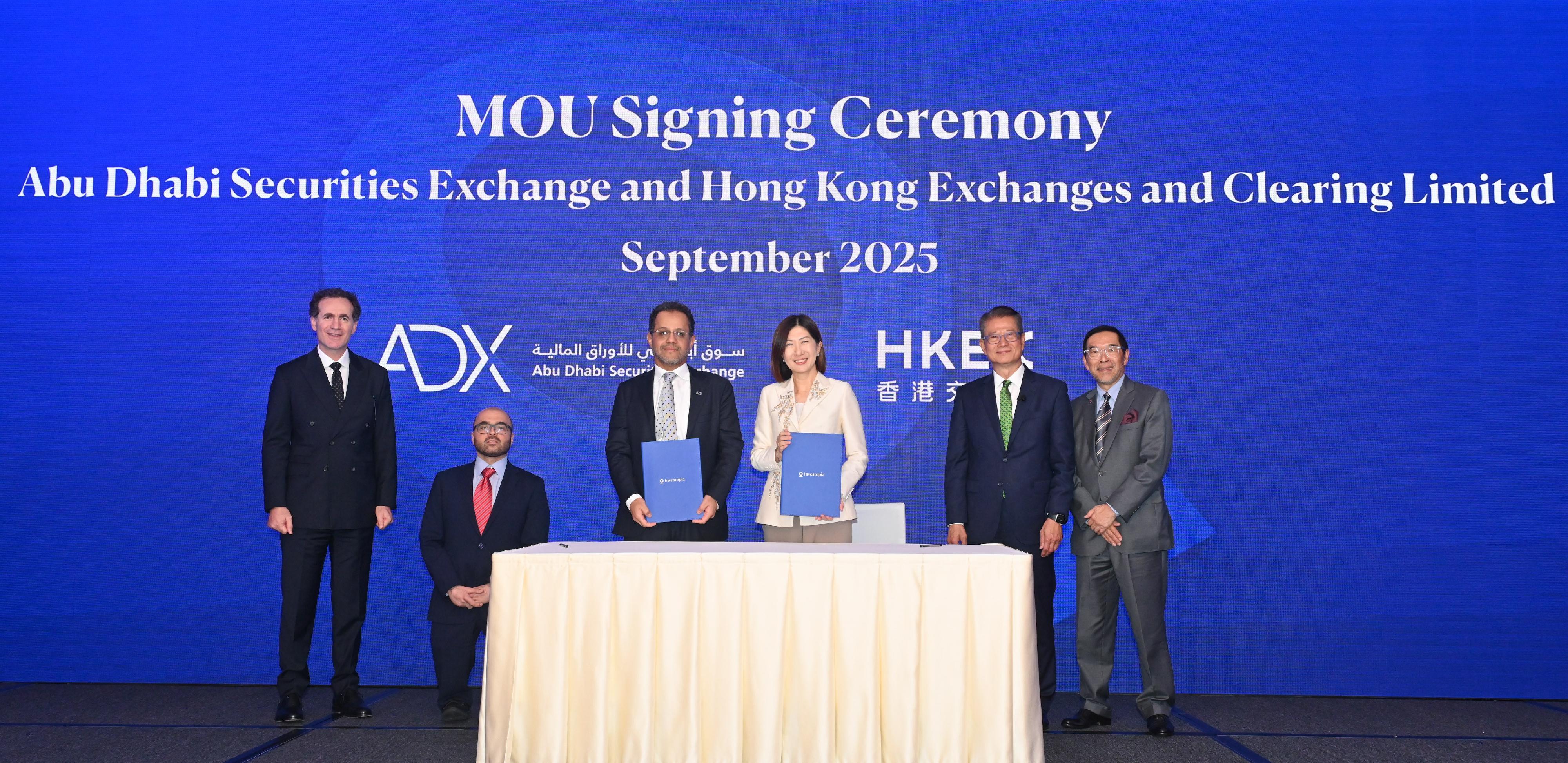 Investopia, the United Arab Emirate (UAE)'s leading investment platform and ecosystem, concluded yesterday (September 17). Photo shows the signing of a Memorandum of Understanding between the Chief Executive Officer of the Hong Kong Exchanges and Clearing Limited, Ms Bonnie Chan (third right), and the Group Chief Executive Officer of the Abu Dhabi Securities Exchange , Mr Abdulla Salem Alnuaimi (third left), at the Investopia event. The signing ceremony was witnessed by the Financial Secretary, Mr Paul Chan (second right), and the Undersecretary of the UAE Ministry of Investment, Mohammad Alhawi (second left).