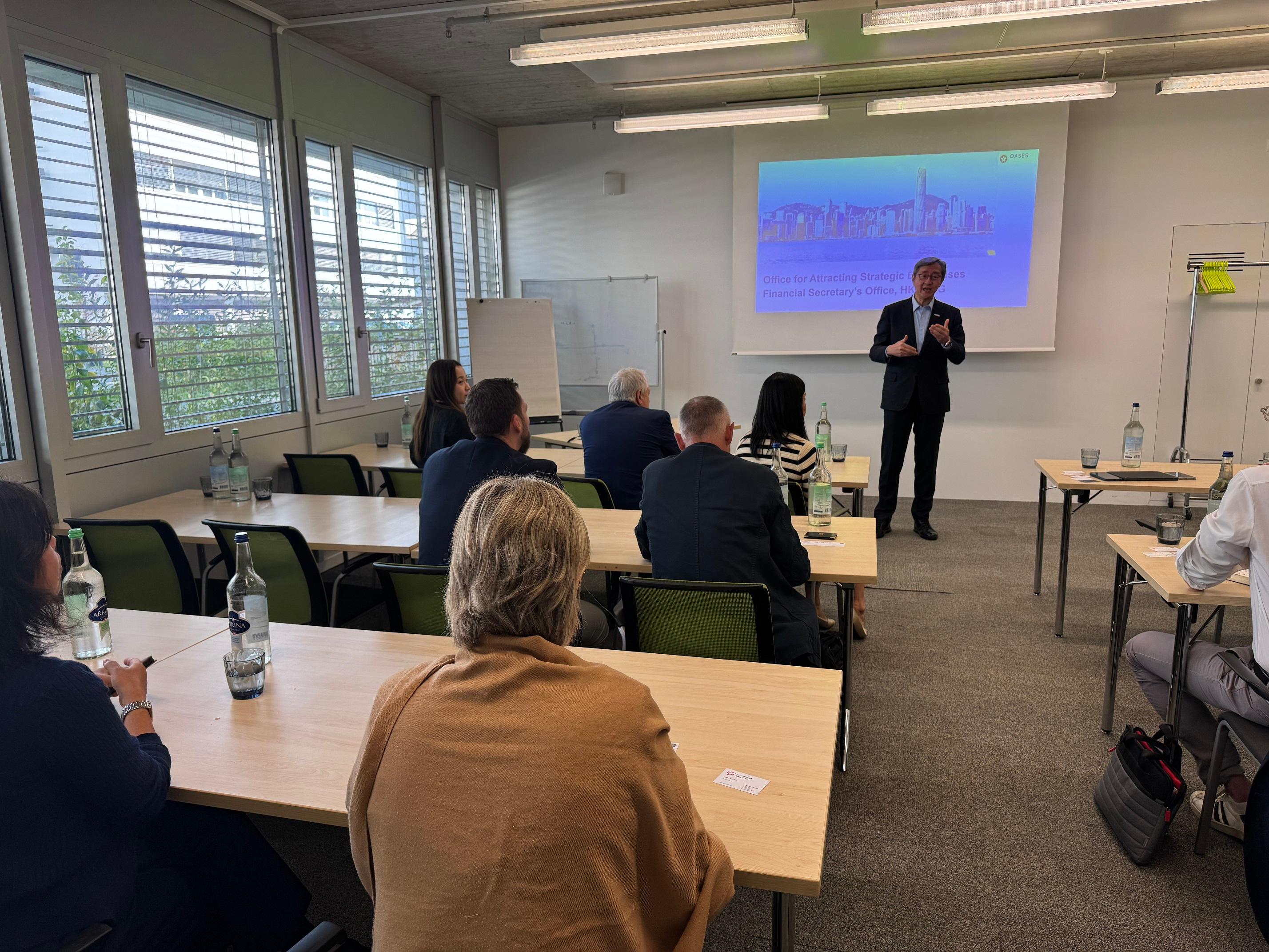 The Director-General of the Office for Attracting Strategic Enterprises (OASES), Mr Peter Yan concluded his visit to Switzerland on September 17. Photo shows Mr Yan sharing the support services offered by OASES to strategic enterprises.