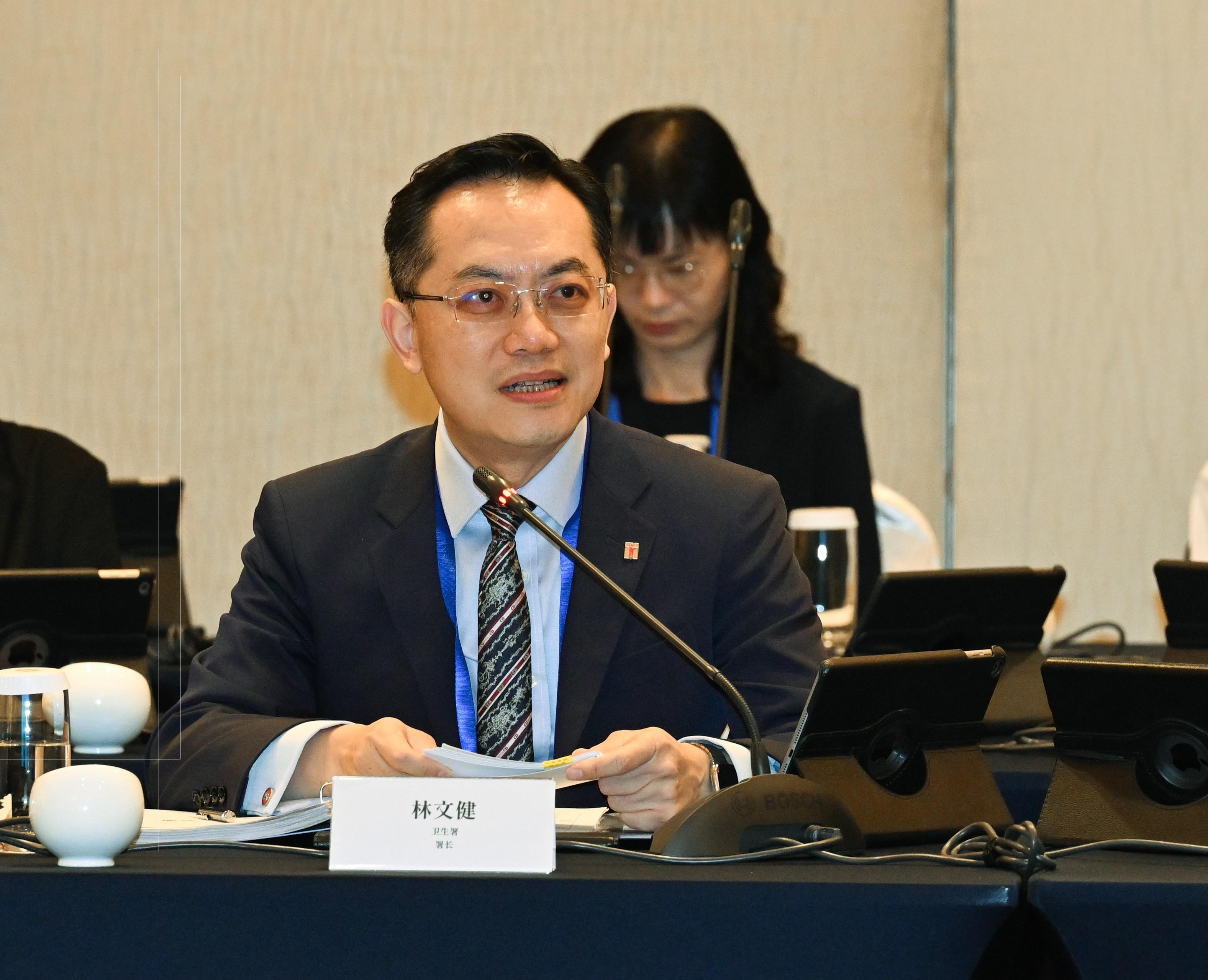 The 22nd Tripartite Meeting on Prevention and Control of Communicable Diseases convened in Hong Kong today (September 22). Photo shows the Director of Health, Dr Ronald Lam, addressing the meeting.