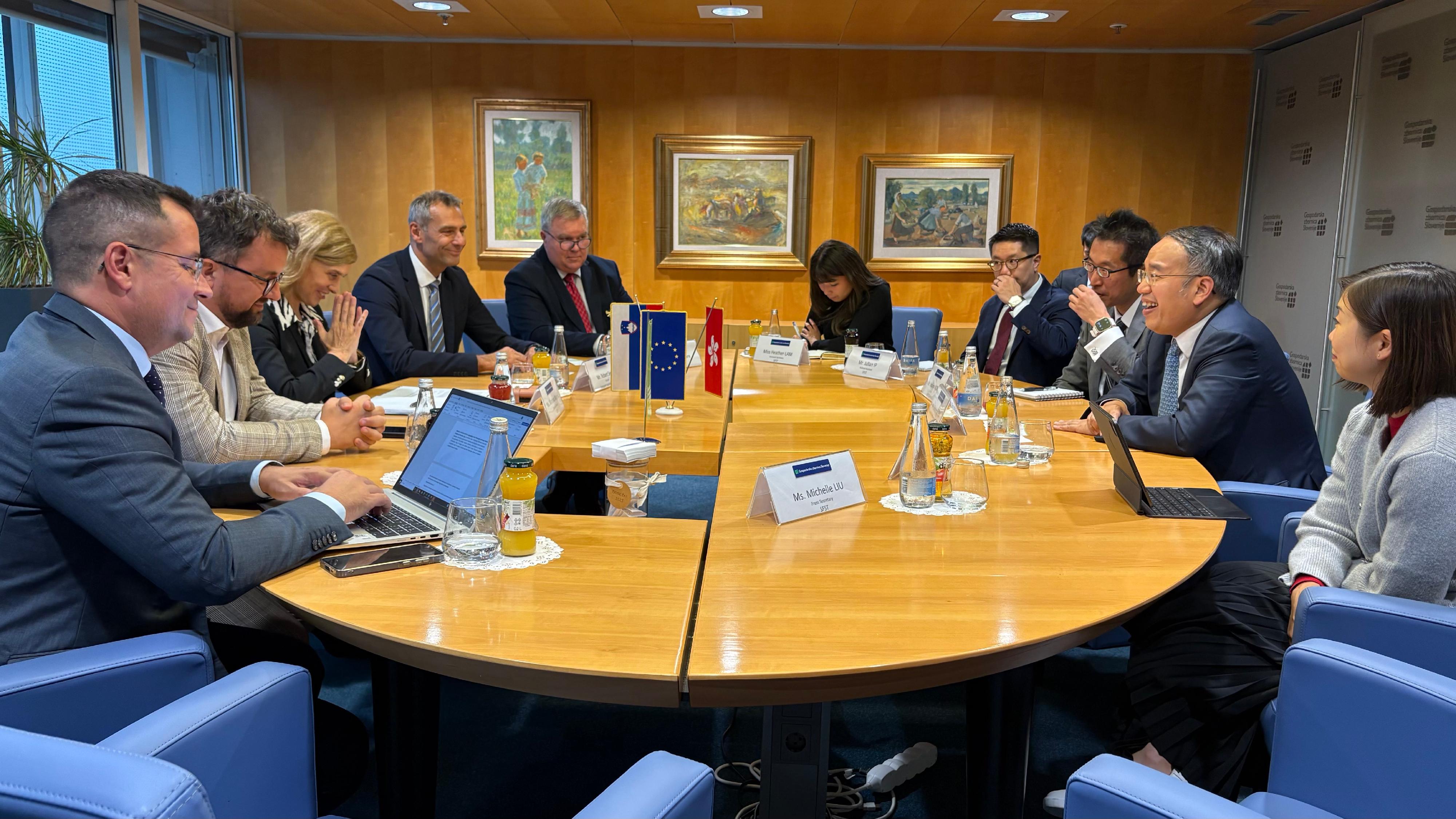 The Secretary for Financial Services and the Treasury, Mr Christopher Hui, joined a business event organised by Slovenia's largest chamber of commerce and industry - the Gospodarska zbornica Slovenije (GZS), in Ljubljana, Slovenia, on September 23 (Ljubljana time). Photo shows Mr Hui (second right) meeting with the GZS Executive Director, Ms Marjana Majerič (third left), and its senior management members. Also attending was the Director of the Hong Kong Economic and Trade Office in Berlin, Mr Indiana Wong (third right).