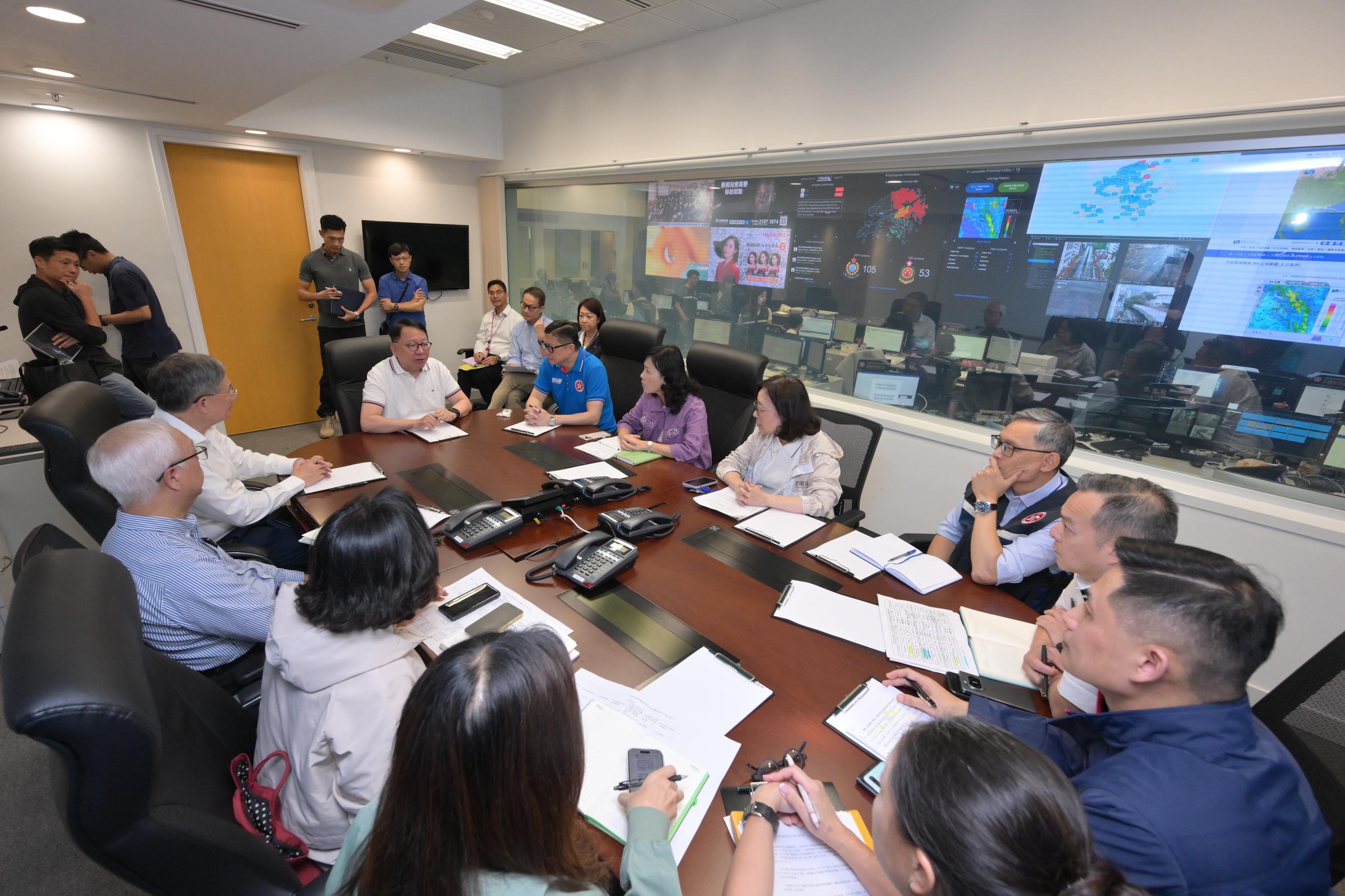 The Chief Secretary for Administration, Mr Chan Kwok-ki (front row, sixth right), chaired a meeting of the steering committee on handling extreme weather this afternoon (September 24) to receive the latest updates from heads of relevant bureaux and departments and conduct a comprehensive review of the progress in emergency response and recovery efforts in relation to Super Typhoon Ragasa by various government departments.