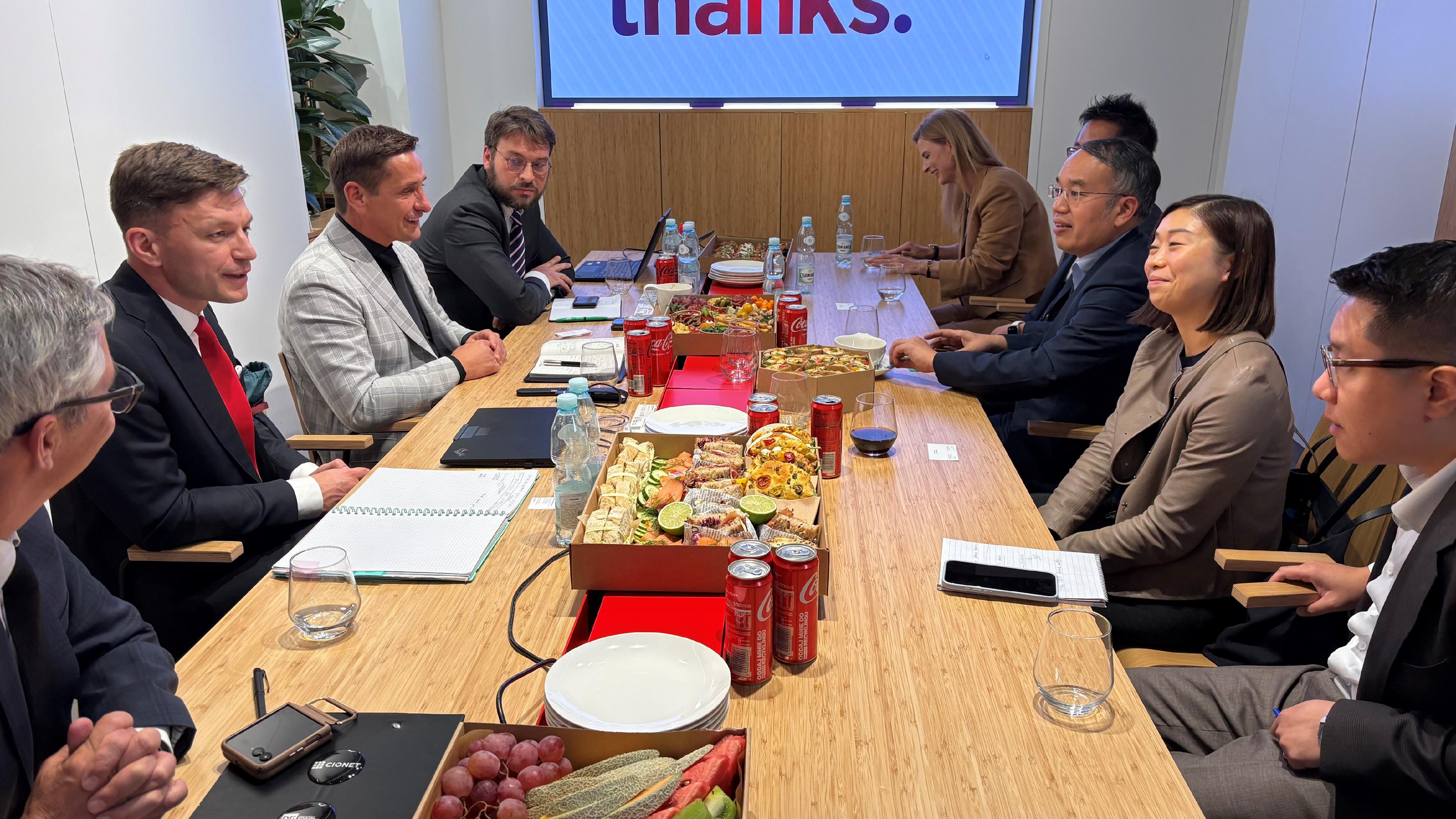 The Secretary for Financial Services and the Treasury, Mr Christopher Hui (third right), went to the Lenovo Technology in Warsaw, Poland, on September 24 (Warsaw time) to meet with its General Manager at Lenovo Poland, Mr Wojciech Zaskorski (third left), and other senior members of the company to have a better grasp of the macroeconomics and digitalisation of Poland, as well as the challenges encountered by Mainland companies in going global.

