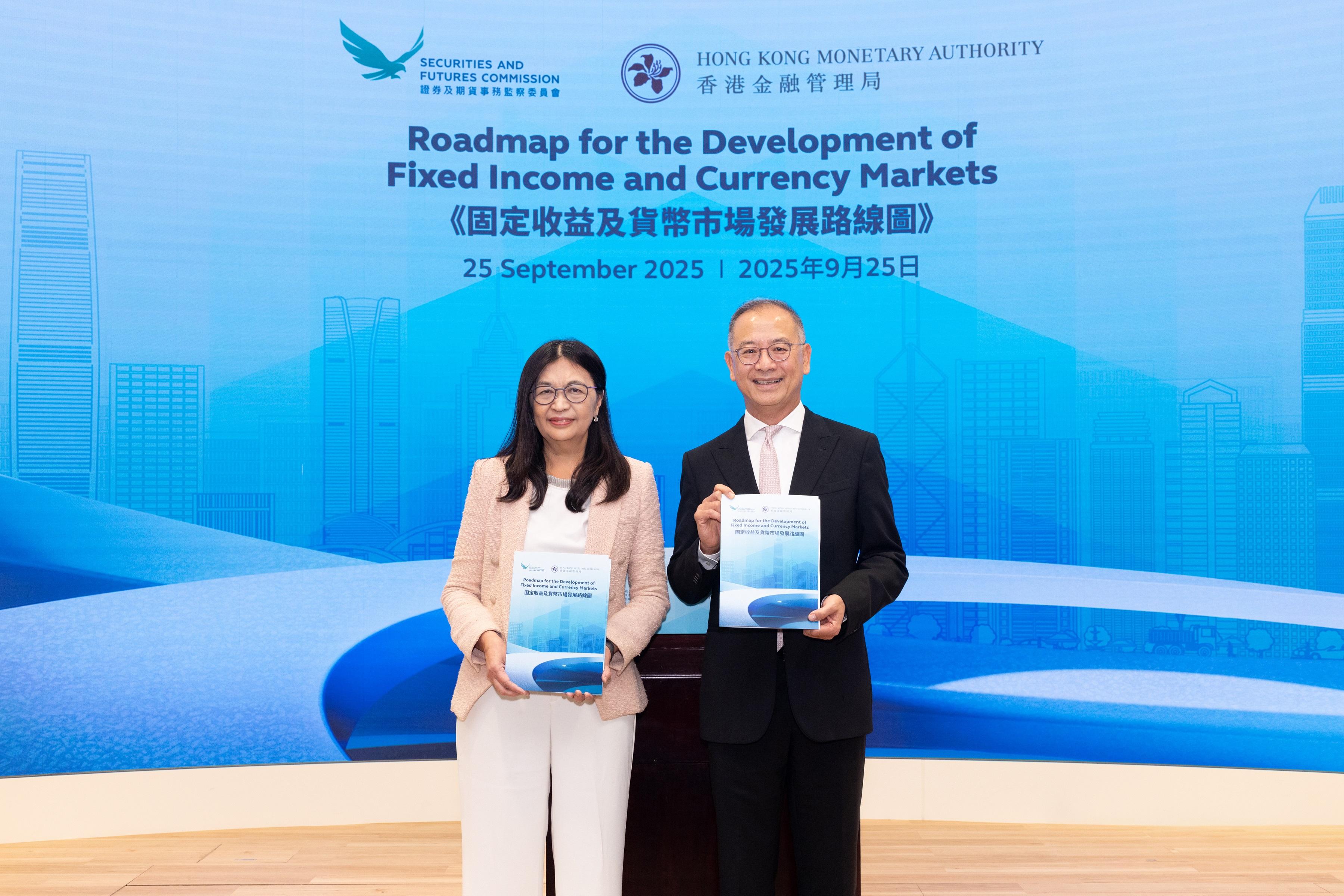The Securities and Futures Commission (SFC) and the Hong Kong Monetary Authority (HKMA) jointly announced Hong Kong's Roadmap for the Development of Fixed Income and Currency Markets today (September 25). Photo shows the Chief Executive Officer of the SFC, Ms Julia Leung (left), with the Chief Executive of the HKMA, Mr Eddie Yue (right) .